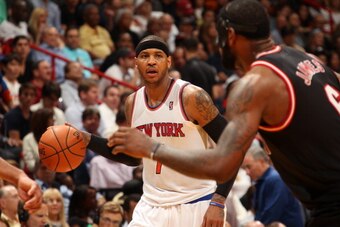 MIAMI, FL - February 27: Carmelo Anthony #7 of the New York Knicks handles the ball during a game against the Miami Heat at the American Airlines Arena in Miami, Florida on Feb. 27, 2014. NOTE TO USER: User expressly acknowledges and agrees that, by downl