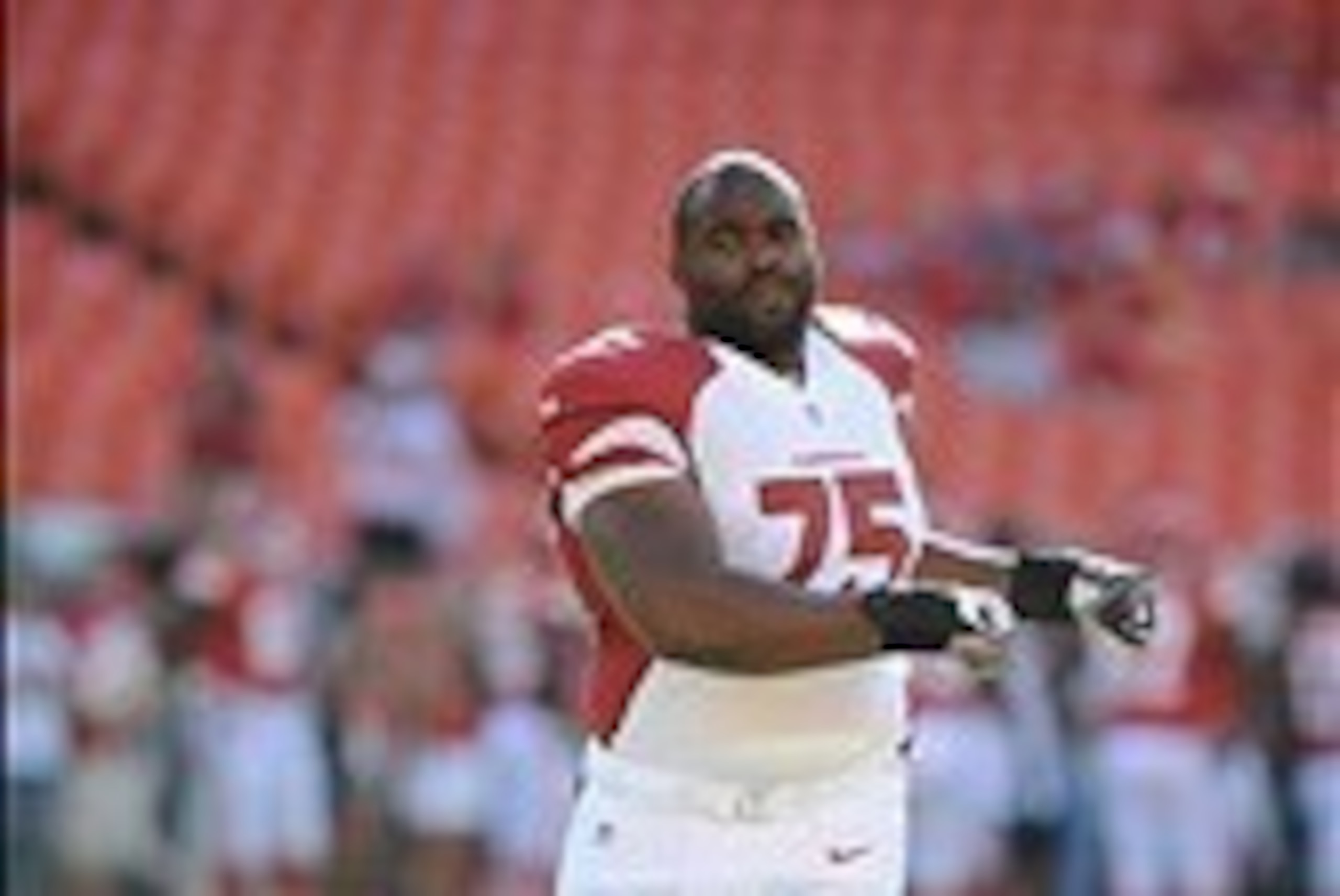 Aug 10, 2012; Kansas City, MO, USA; Arizona Cardinals tackle Levi Brown (75) warms up before the game against the Kansas City Chiefs at Arrowhead Stadium. Kansas City won the game 27-17. Mandatory Credit: John Rieger-USA TODAY Sports