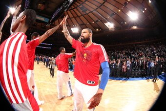 NEW YORK, NY - JANUARY 28: Tyson Chandler #6 of the New York Knicks wears a warm-up jersey in celebration of the Chinese New Year before a game against the Boston Celtics during a game at Madison Square Garden in New York City on January 28, 2014.  NOTE T