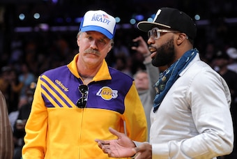 November 11, 2012; Los Angeles, CA, USA;  Movie actor Will Ferrell (left) talks to former NBA player Baron Davis before the game between the Los Angeles Lakers and the Sacramento Kings at the Staples Center. Lakers won 103-90. Mandatory Credit: Jayne Kami