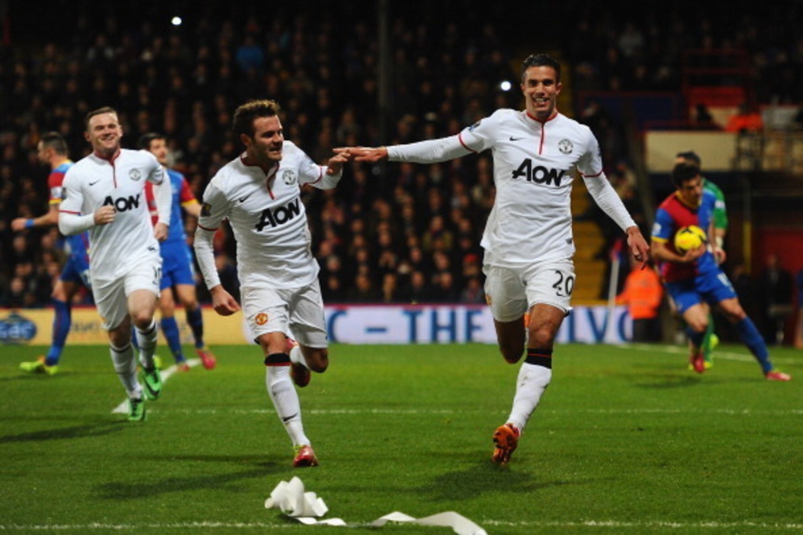 LONDON, ENGLAND - FEBRUARY 22:  Robin Van Persie of Man United celebrates with Juan Mata after scoring from the spot during the Barclays Premier League match between Crystal Palace and Manchester United at Selhurst Park on February 22, 2014 in London, Eng