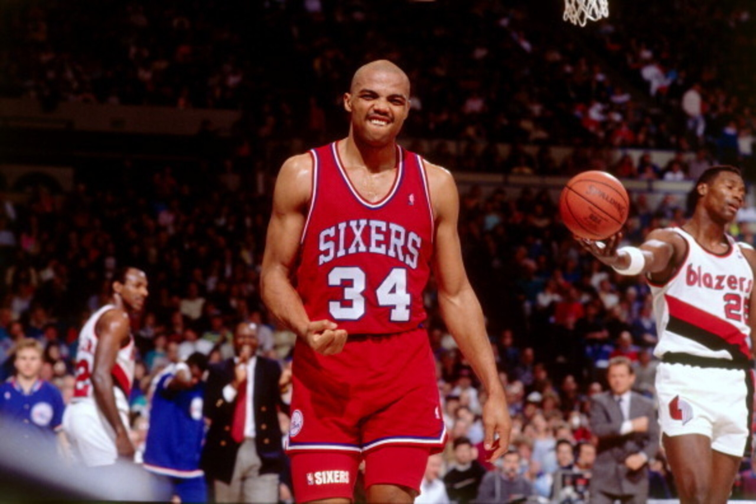 PORTLAND, OR - CIRCA 1990: Charles Barkley #34 of the Philadelphia 76ers reacts against the Portland Trailblazers  circa 1990 at the Veterans Memorial Coliseum in Portland, Oregon. NOTE TO USER: User expressly acknowledges and agrees that, by downloading 