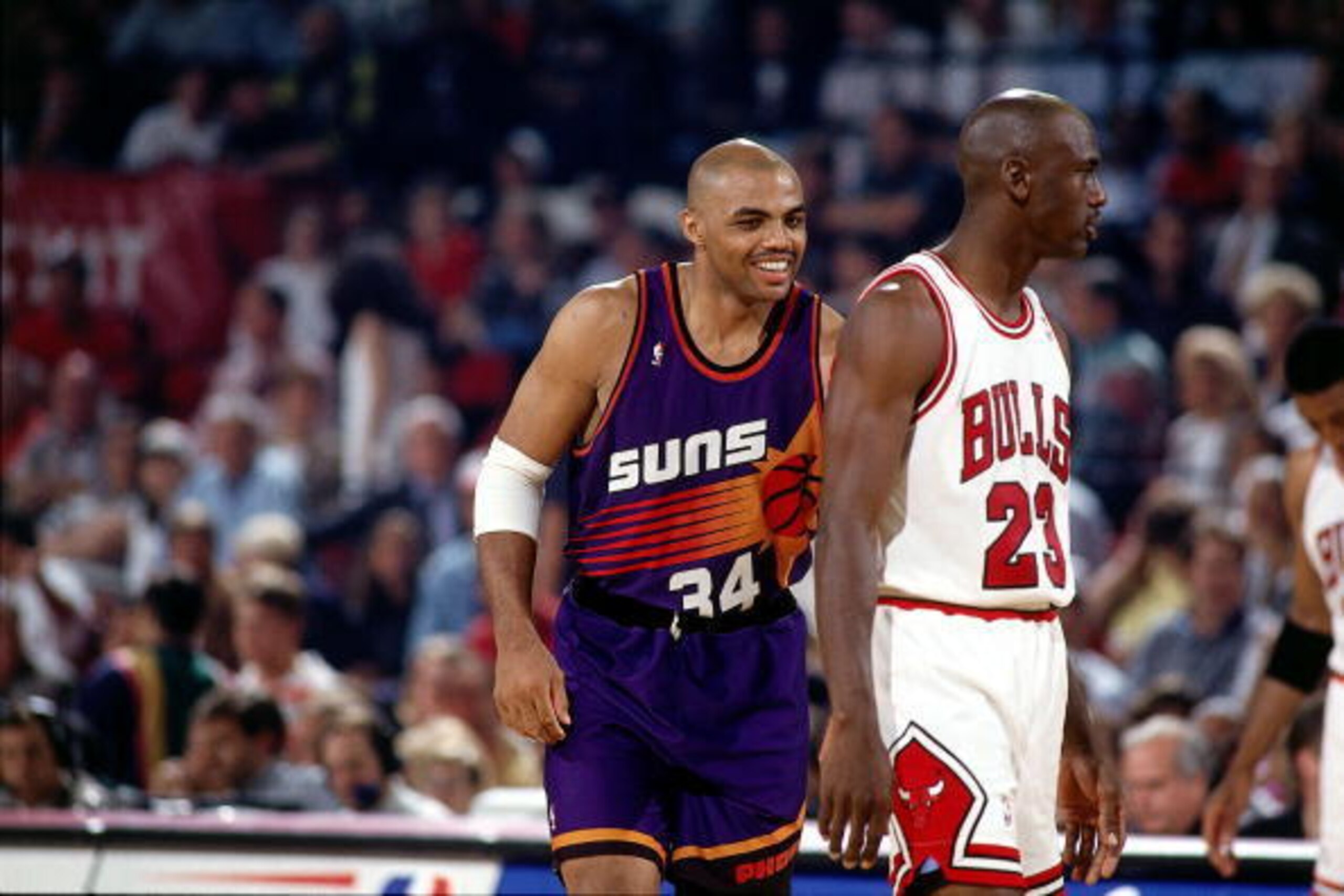 CHICAGO - JUNE 13:  Charles Barkley #34 of the Phoenix Suns and Michael Jordan #23 of the Chicago Bulls during Game Three of the 1993 NBA Championsip Finals at Chicago Stadium on June 13, 1993 in Chicago, Illinois.  The Suns won 129-121 in triple overtime