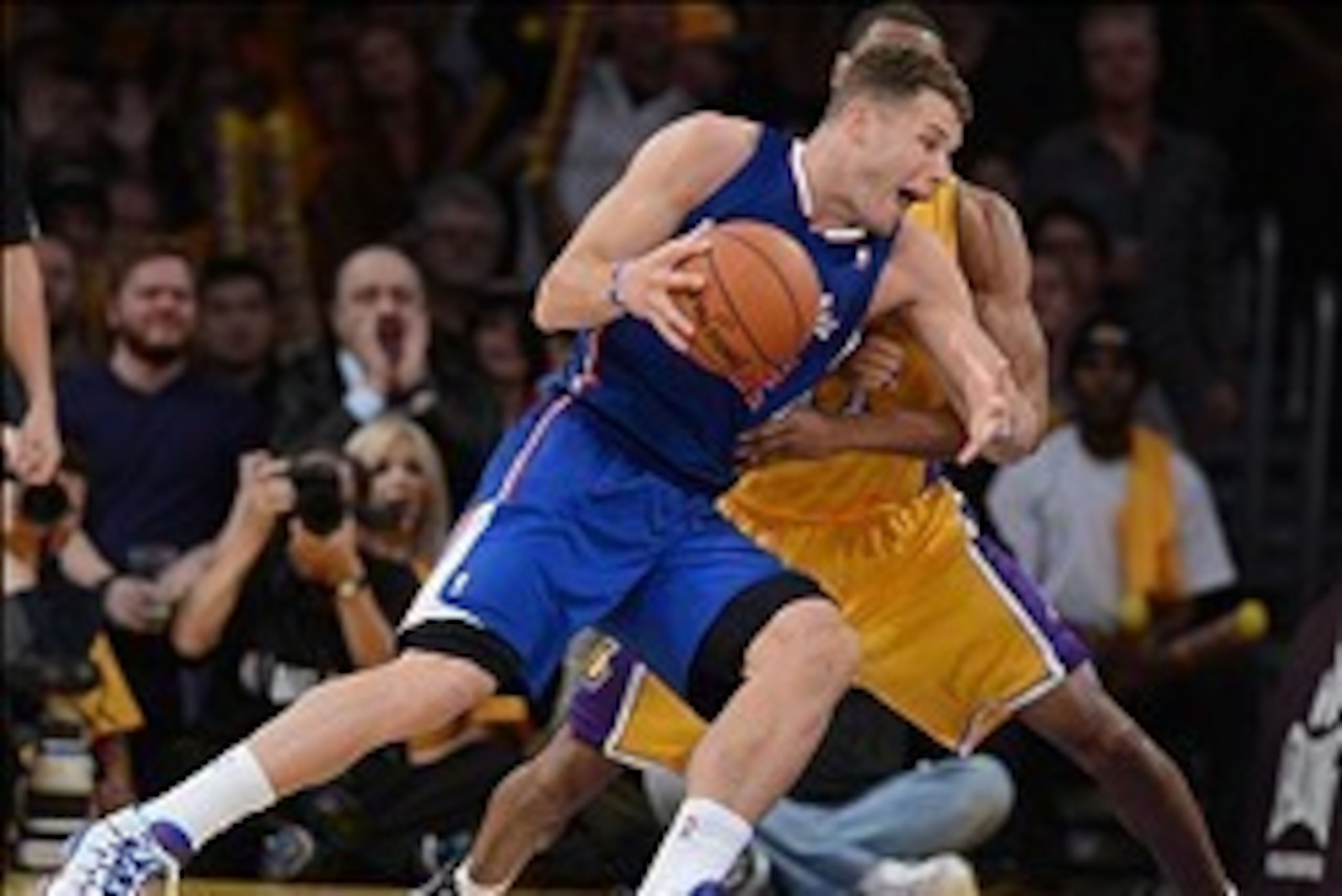 Oct 29, 2013; Los Angeles, CA, USA;   Los Angeles Lakers shooting guard Wesley Johnson (11) guards Los Angeles Clippers power forward Blake Griffin (32) in the second half of the game at the Staples Center. Lakers won 116-103. Mandatory Credit: Jayne Kami