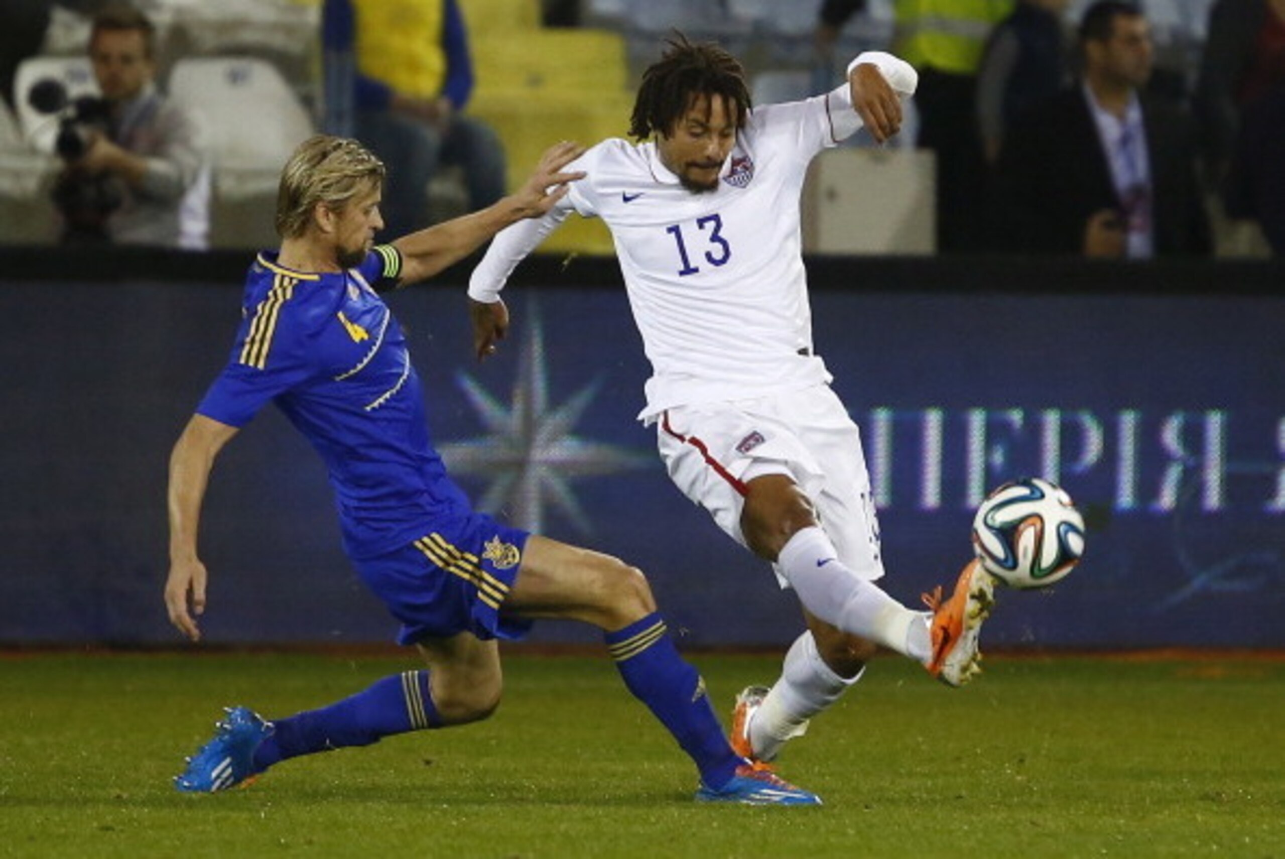 LARNACA, CYPRUS - MARCH 05:  Anatoliy Tymoshchuk (L) of Ukraine andJermaine Jones of the USA in action during the Ukraine v USA International Friendly  at Antonis Papadopoulos stadium on March 5, 2014 in Larnaca, Cyprus.  (Photo by Andrew Caballero-Reynol