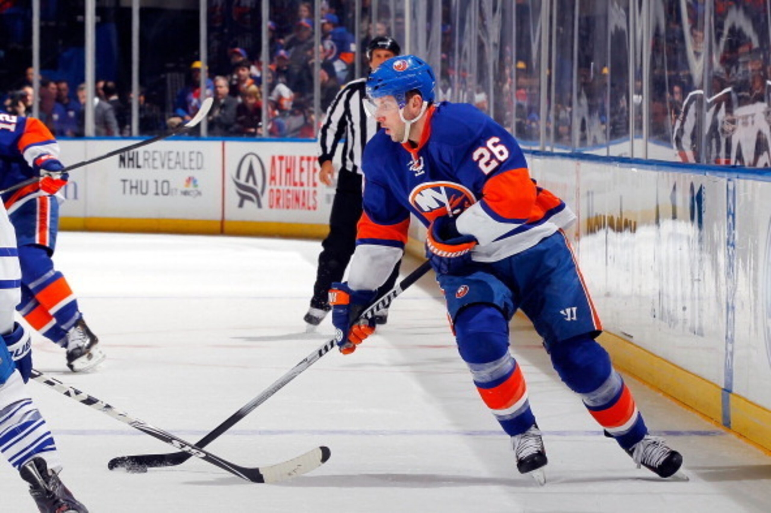 UNIONDALE, NY - FEBRUARY 27:  Thomas Vanek #26 of the New York Islanders in action against the Toronto Maple Leafs on February 27, 2014 at Nassau Coliseum in Uniondale, New York. The Islanders defeated the Maple Leafs 5-4 in overtime.  (Photo by Jim McIsa