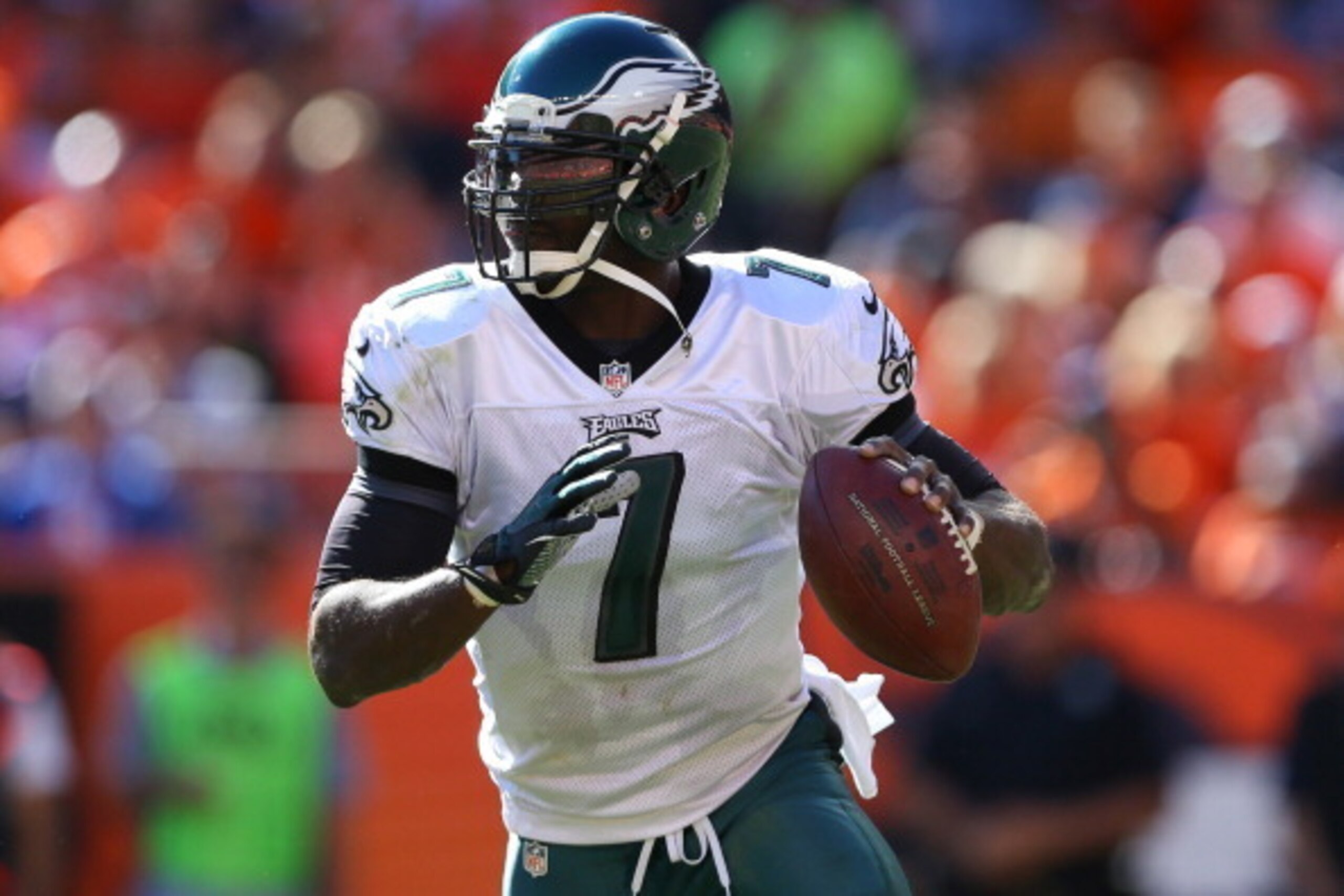 DENVER, CO - SEPTEMBER 29:  Quarterback Michael Vick #7 of the Philadelphia Eagles in action against the Denver Broncos at Sports Authority Field Field at Mile High on September 29, 2013 in Denver, Colorado.  (Photo by Justin Edmonds/Getty Images)
