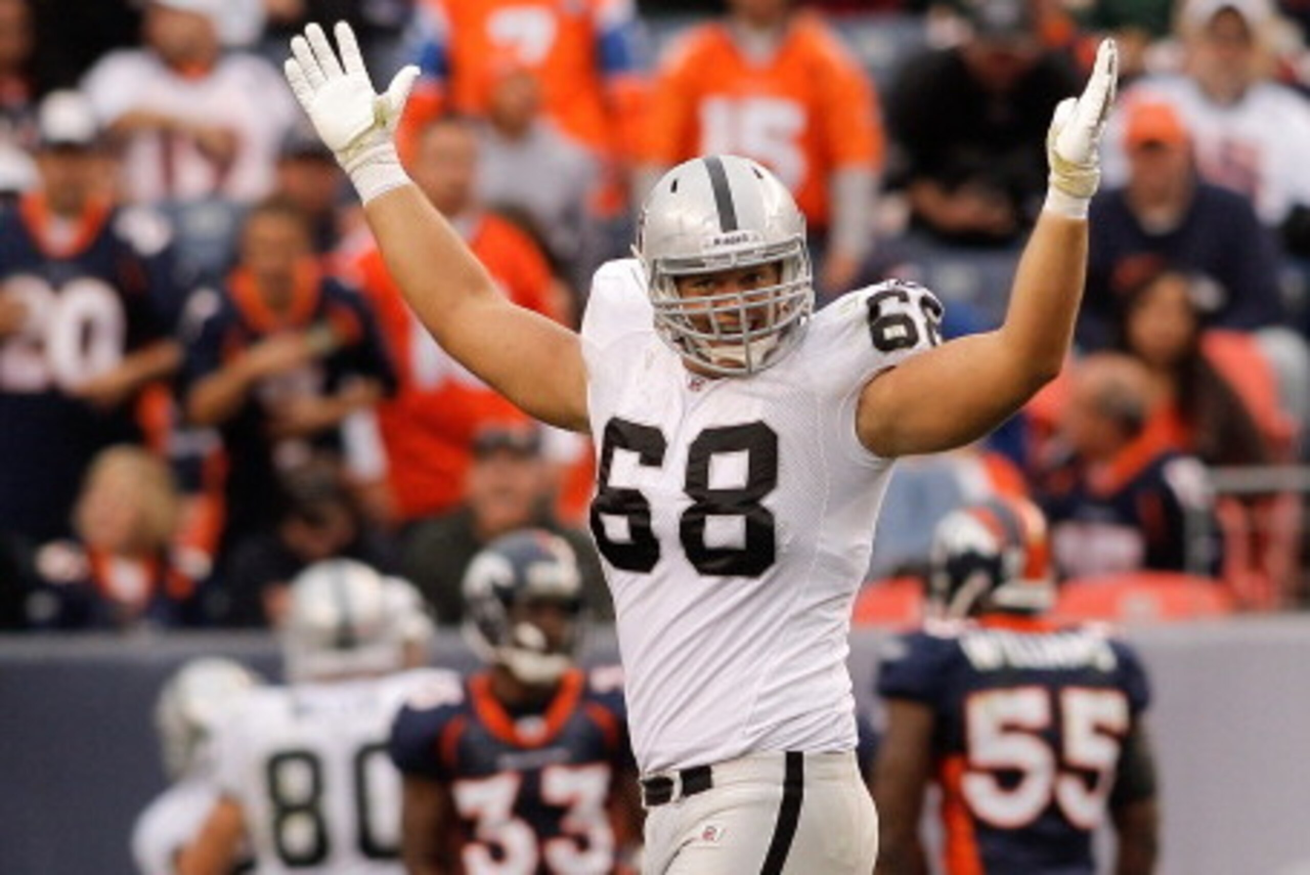 DENVER - OCTOBER 24:  Center Jared Veldheer #68 of the Oakland Raiders celebrates a touchdown by teammate Darren McFadden (not pictured) in the third quarter against the Denver Broncos at INVESCO Field at Mile High on October 24, 2010 in Denver, Colorado.