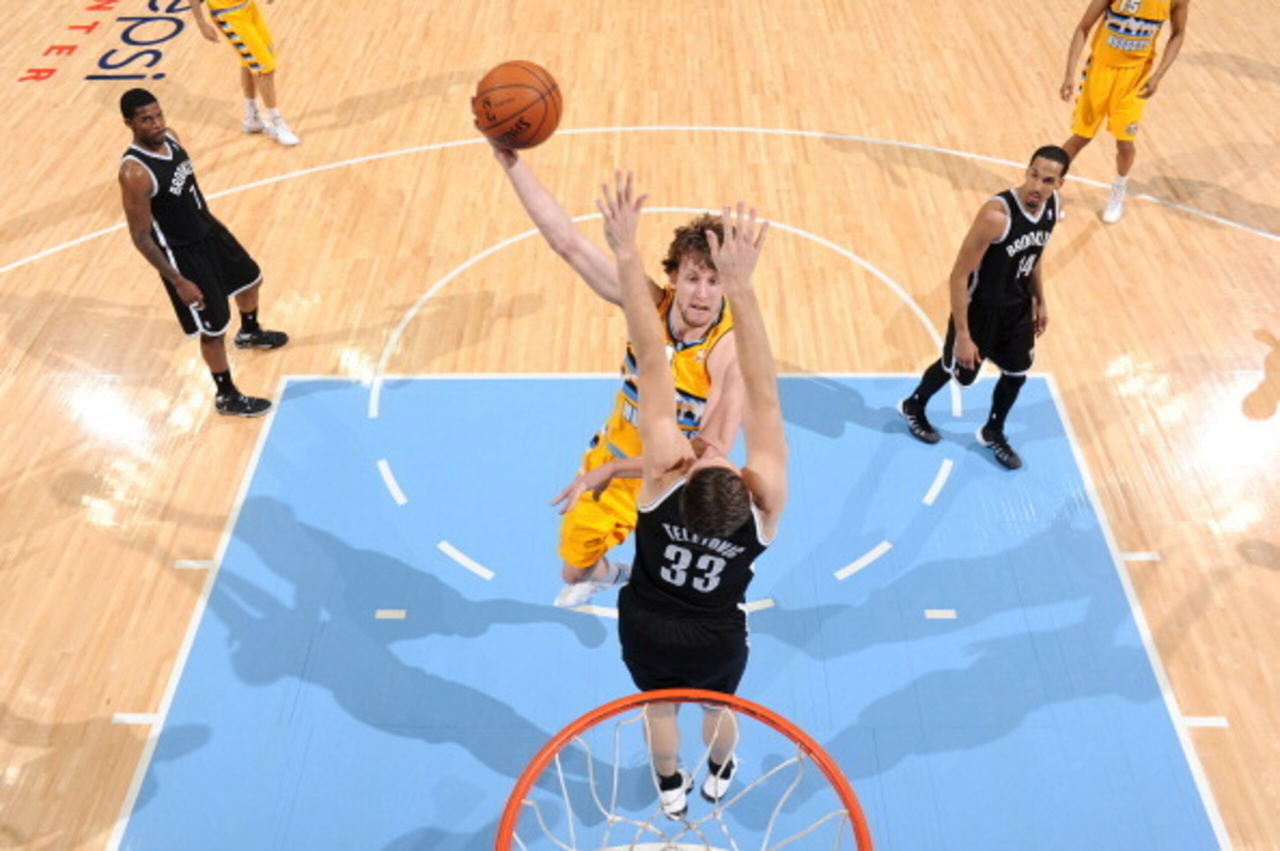 DENVER, CO - FEBRUARY 27: Jan Vesely #24 of the Denver Nuggets takes a shot during a game against the Brooklyn Nets on February 27, 2014 at the Pepsi Center in Denver, Colorado. NOTE TO USER: User expressly acknowledges and agrees that, by downloading and DENVER, CO - FEBRUARY 27: Jan Vesely #24 of the Denver Nuggets takes a shot during a game against the Brooklyn Nets on February 27, 2014 at the Pepsi Center in Denver, Colorado. NOTE TO USER: User expressly acknowledges and agrees that, by downloading and