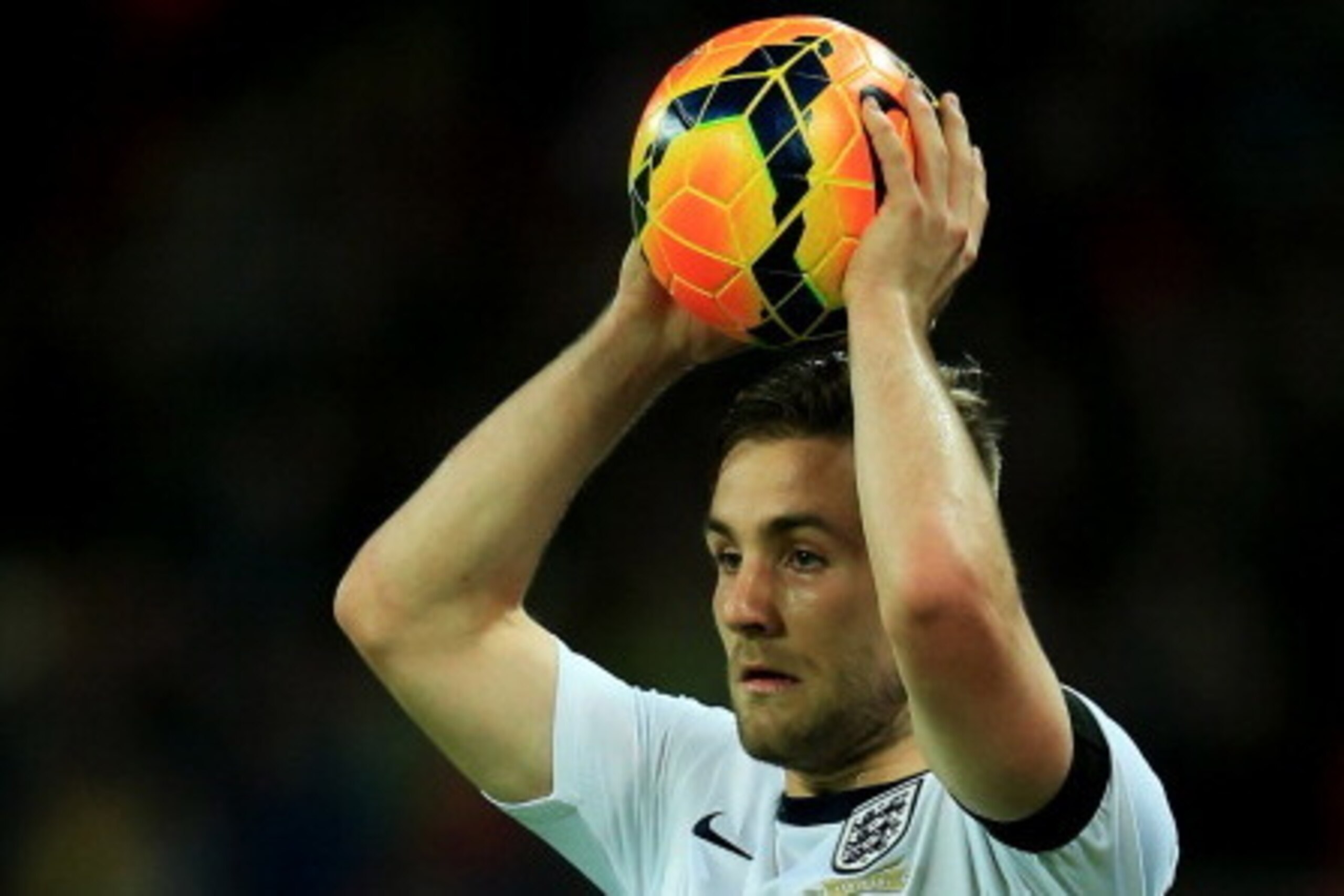 LONDON, ENGLAND - MARCH 05:  Luke Shaw of England takes a throw in during the International Friendly match between England and Denmark at Wembley Stadium on March 5, 2014 in London, England.  (Photo by Richard Heathcote/Getty Images)