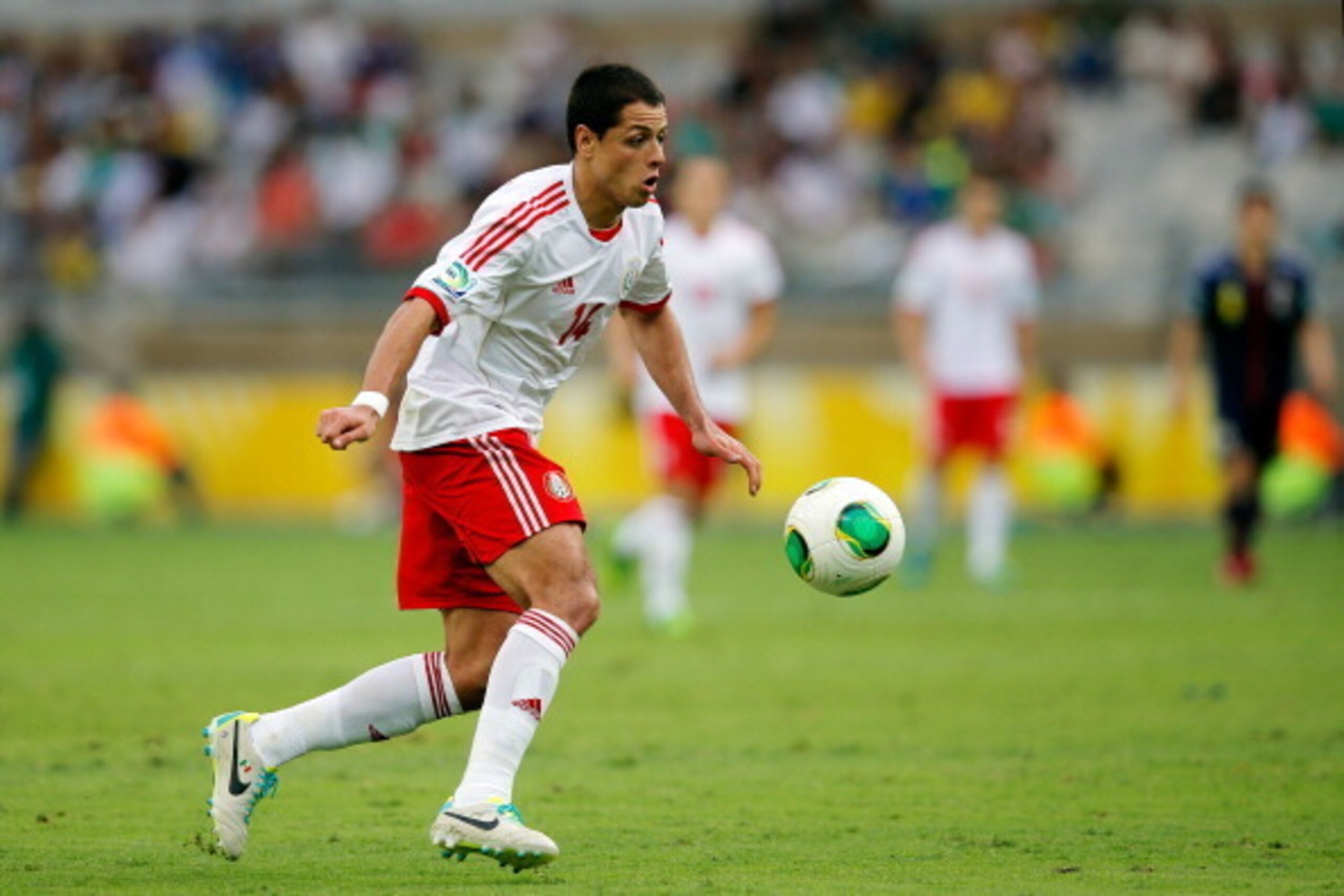 BELO HORIZONTE, BRAZIL - JUNE 22: Javier Hernandez of Mexico in action during the FIFA Confederations Cup Brazil 2013 Group A match between Japan and Mexico at Estadio Mineirao on June 22, 2013 in Belo Horizonte, Brazil.  (Photo by Dean Mouhtaropoulos/Get