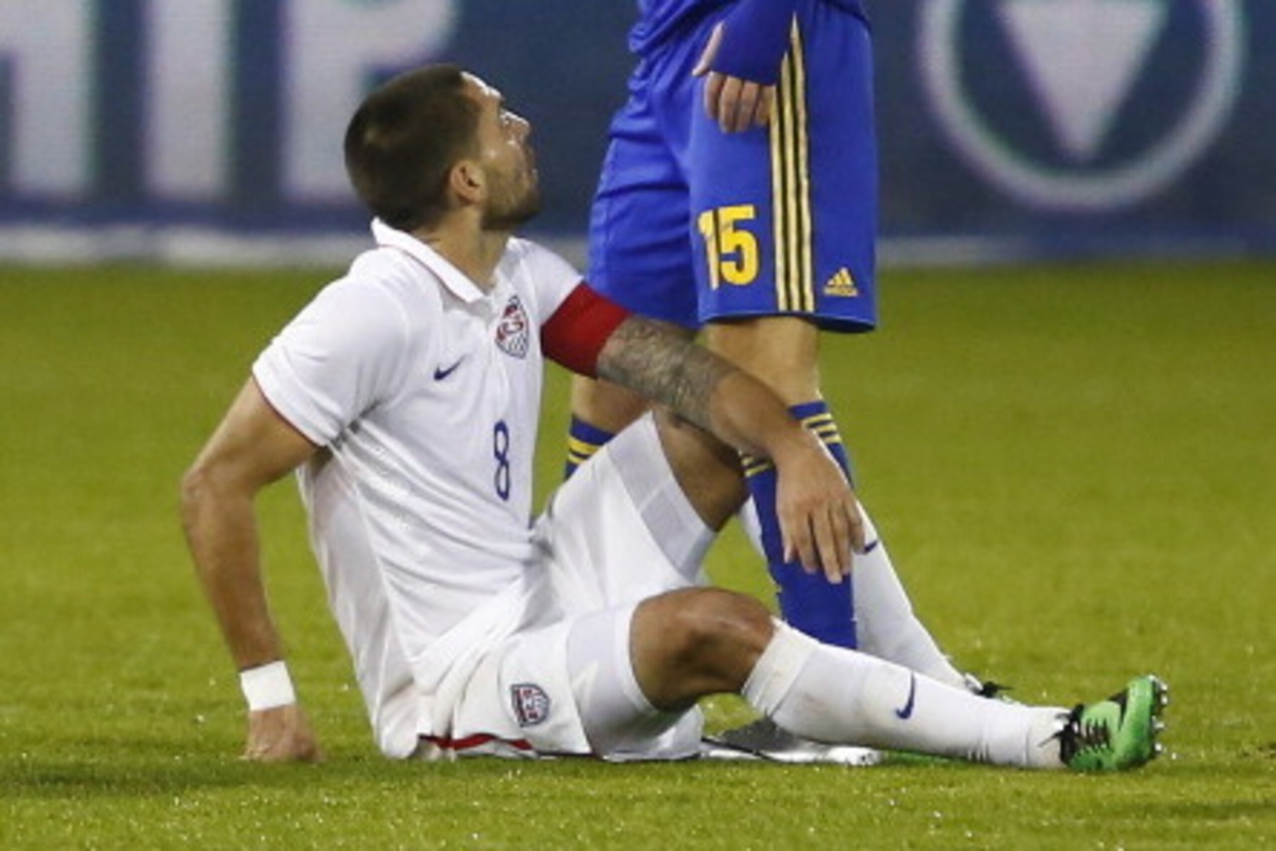LARNACA, CYPRUS - MARCH 05: Roman Bezus (R) of the Ukraine stands over Clint Dempsey of the USA during the Ukraine v USA International Friendly at Antonis Papadopoulos stadium on March 5, 2014 in Larnaca, Cyprus. (Photo by Andrew Caballero-Reynolds/Get LARNACA, CYPRUS - MARCH 05: Roman Bezus (R) of the Ukraine stands over Clint Dempsey of the USA during the Ukraine v USA International Friendly at Antonis Papadopoulos stadium on March 5, 2014 in Larnaca, Cyprus. (Photo by Andrew Caballero-Reynolds/Get