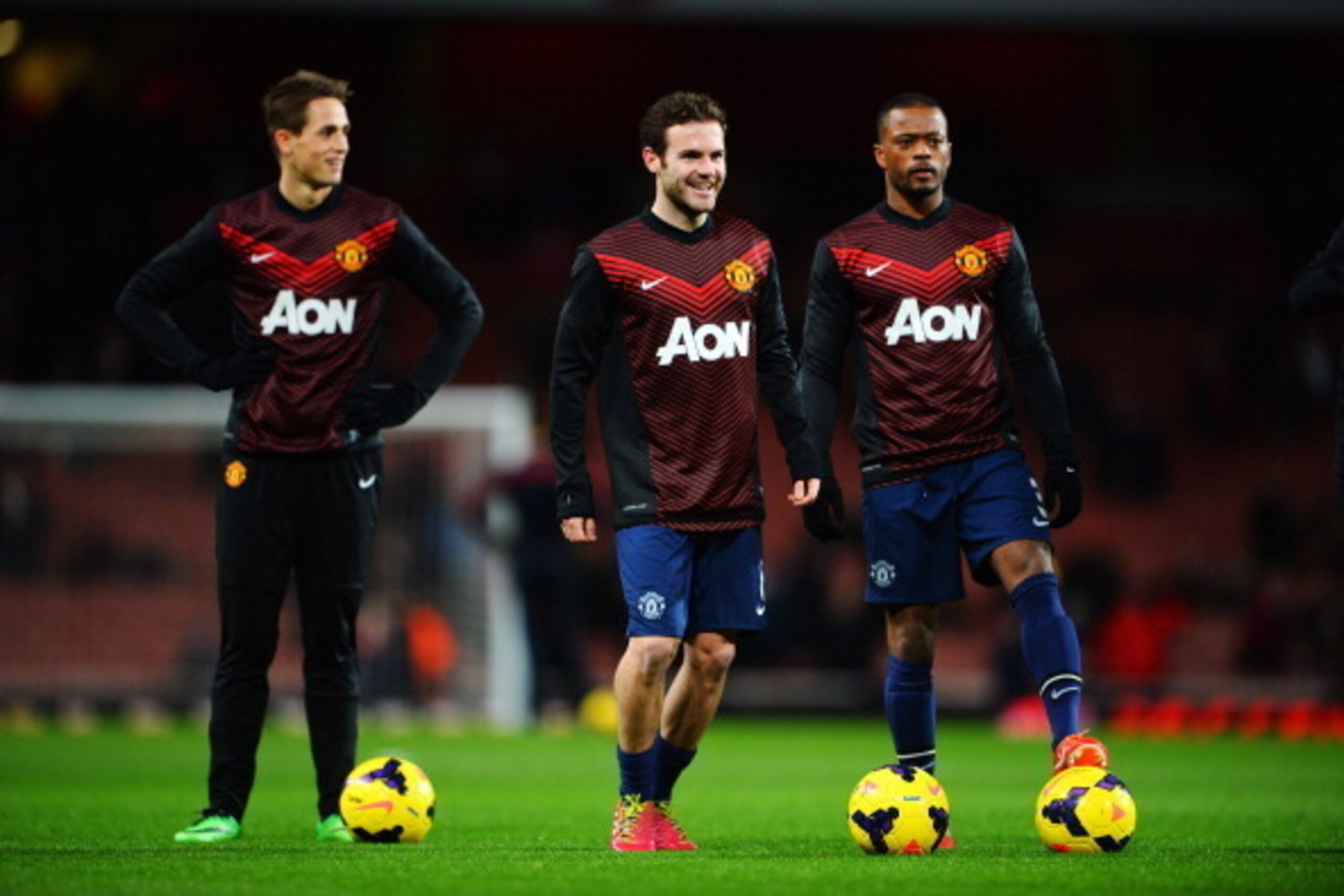 LONDON, ENGLAND - FEBRUARY 12: (L-R) Adnan Januzaj, Juan Mata and Patrice Evra of Manchester United warm up before the Barclays Premier League match between Arsenal and Manchester United at the Emirates Stadium on February 12, 2014 in London, England. ( LONDON, ENGLAND - FEBRUARY 12: (L-R) Adnan Januzaj, Juan Mata and Patrice Evra of Manchester United warm up before the Barclays Premier League match between Arsenal and Manchester United at the Emirates Stadium on February 12, 2014 in London, England. (