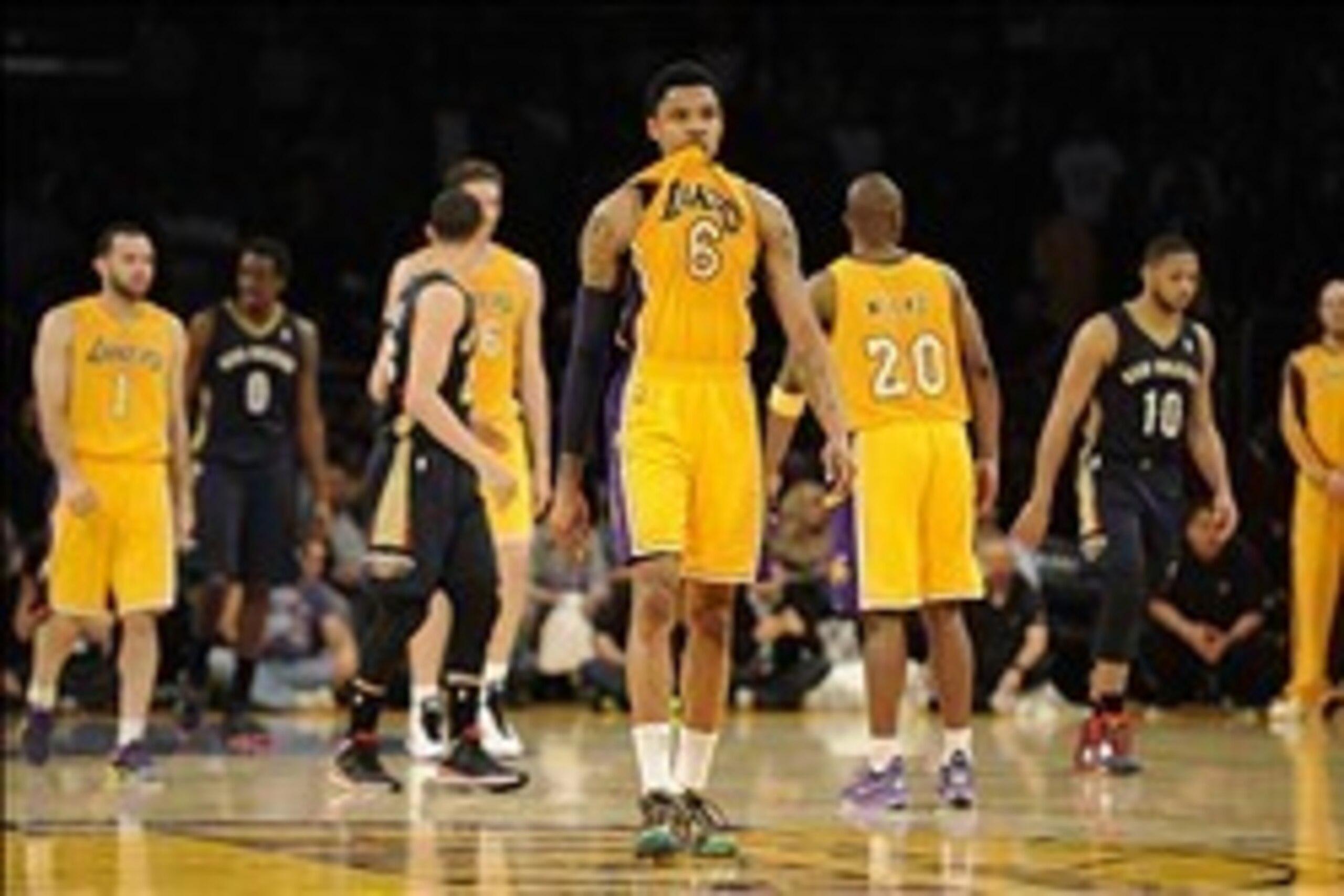 Mar 4, 2014; Los Angeles, CA, USA; Los Angeles Lakers guard Kent Bazemore (6) reacts after missing a shot against the New Orleans Pelicans during the fourth quarter at Staples Center. The New Orleans Pelicans defeated the Los Angeles Lakers 132-125. Manda