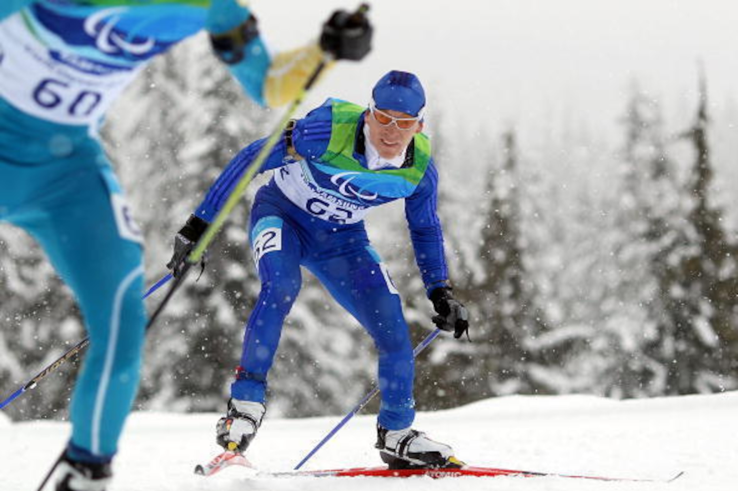 VANCOUVER, BC - MARCH 13: Nikolay Polukhin of Russia competes during the Men's 3km Pursuit Visually Impaired Biathlon on Day 2 of the 2010 Vancouver Winter Paralympics at Whistler Paralympic Park on March 13, 2010 in Whistler, Canada.  (Photo by Hannah Pe