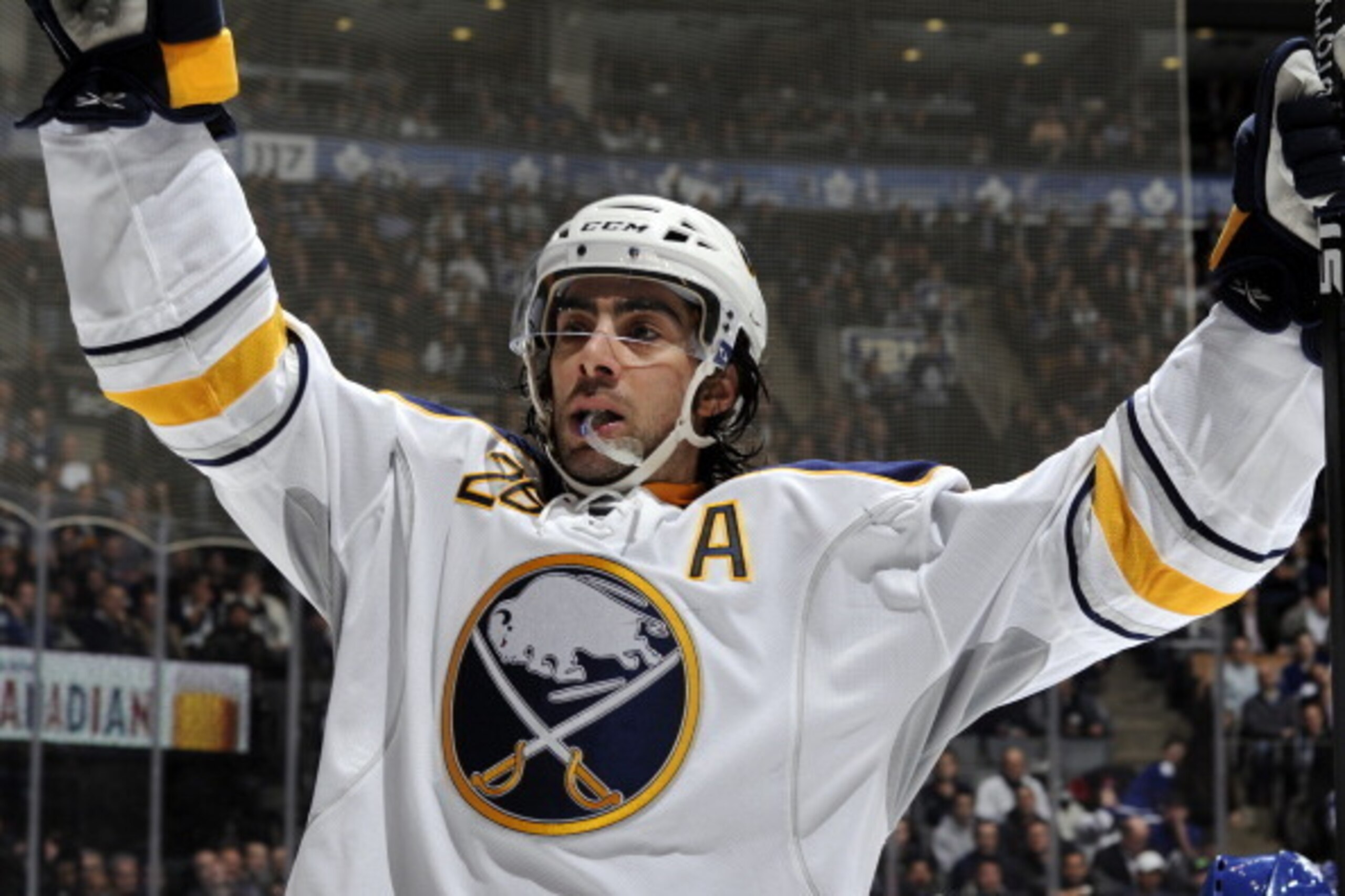 TORONTO , ON - JANUARY 15: Matt Moulson #26 of the Buffalo Sabres celebrates his goal against the Toronto Maple Leafs during NHL game action January 15, 2014 at the Air Canada Centre in Toronto, Ontario, Canada. (Photo by Graig Abel/NHLI via Getty Images)