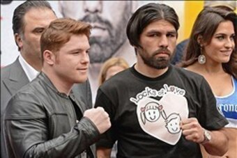 Jan 21, 2014; Los Angeles, CA, USA; Canelo Alvarez (left) and Alfredo Angulo pose during a press conference held at the Los Angeles Central Public Library to announce the 12-round super welterweight bout on March 8, 2014 at the MGM Grand, Las Vegas. Manda