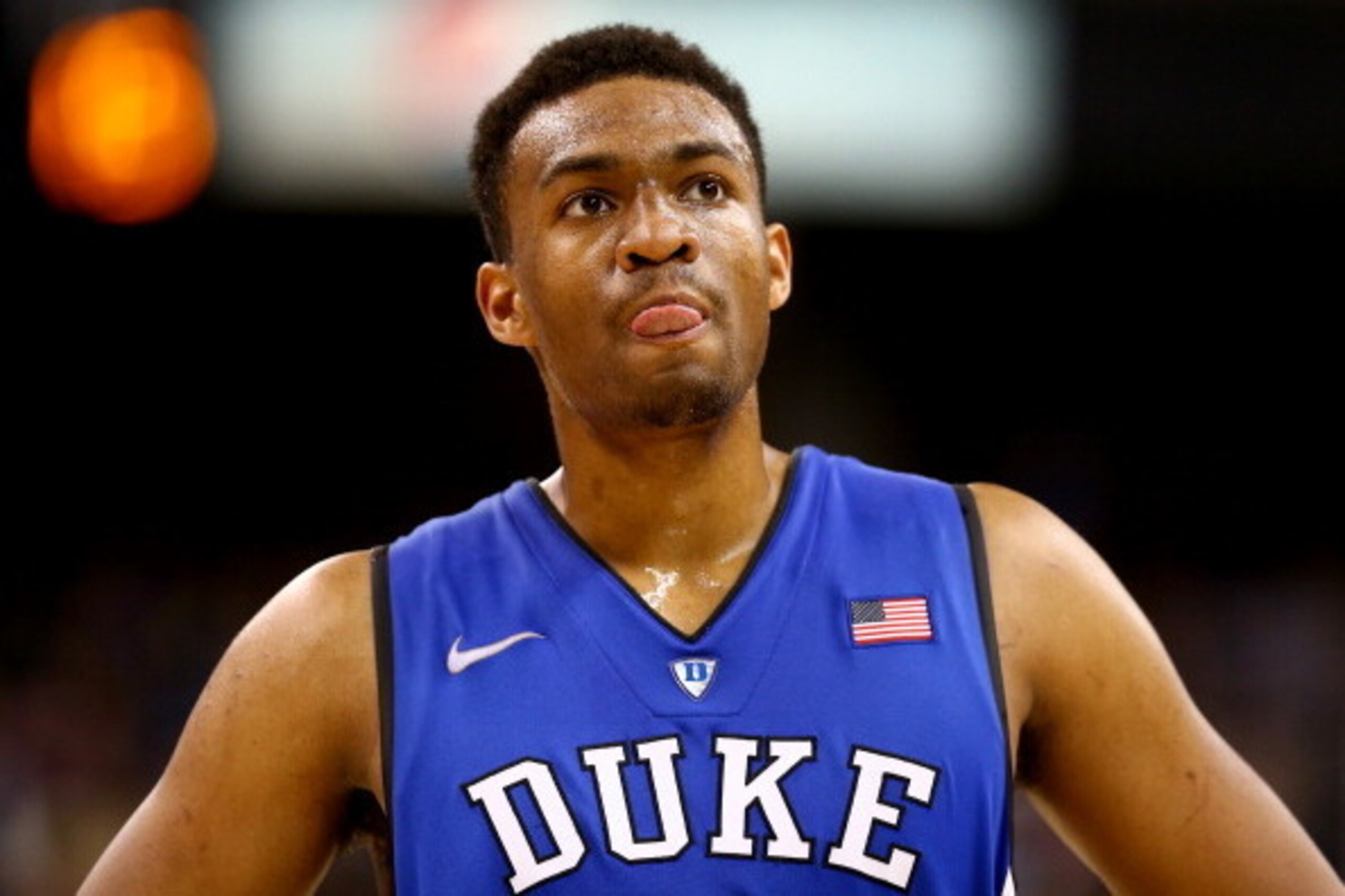 WINSTON-SALEM, NC - MARCH 05:  Jabari Parker #1 of the Duke Blue Devils watches on during their game against the Wake Forest Demon Deacons at Joel Coliseum on March 5, 2014 in Winston-Salem, North Carolina.  (Photo by Streeter Lecka/Getty Images)