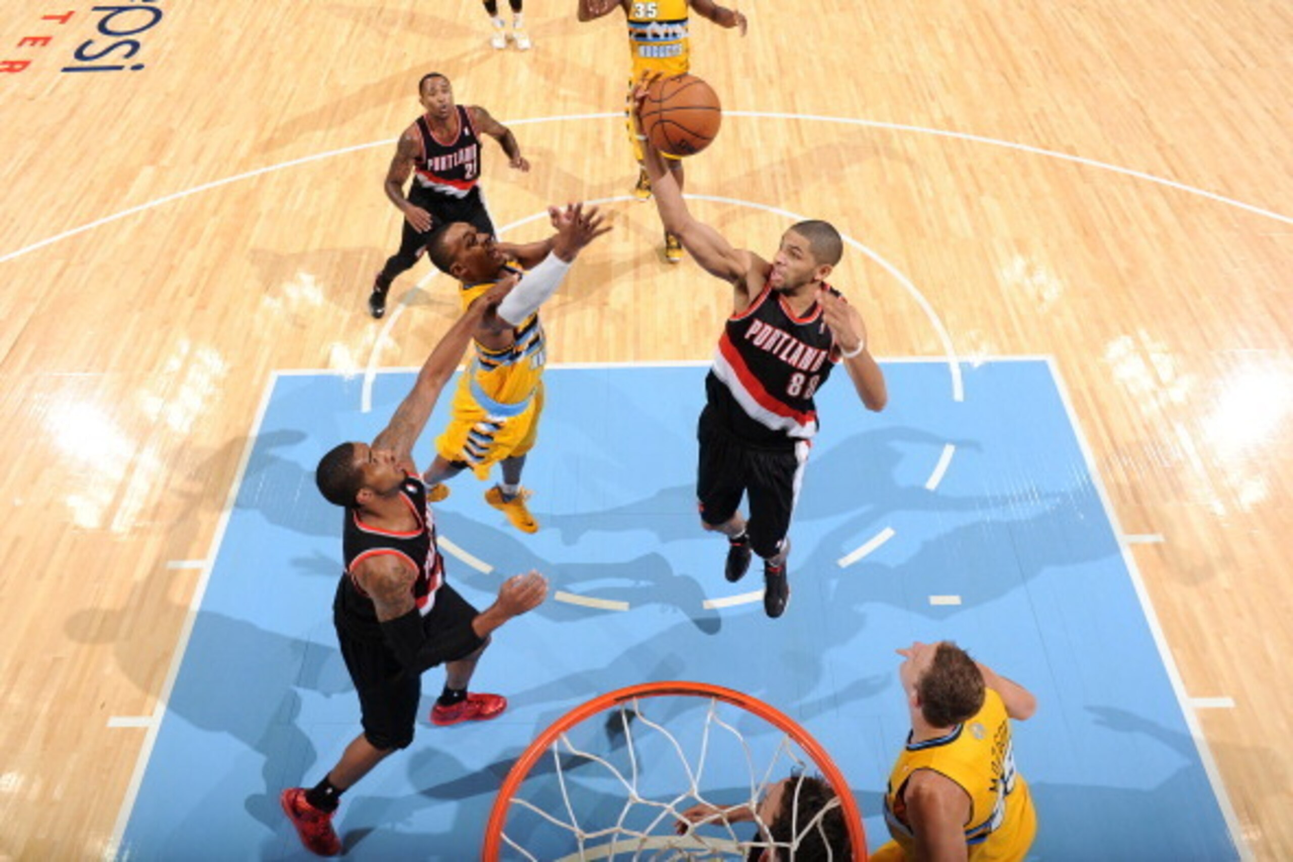 DENVER, CO - NOVEMBER 1: Nicolas Batum #88 of the Portland Trail Blazers grabs a rebound against the Denver Nuggets on November 1, 2013 at the Pepsi Center in Denver, Colorado. NOTE TO USER: User expressly acknowledges and agrees that, by downloading and/
