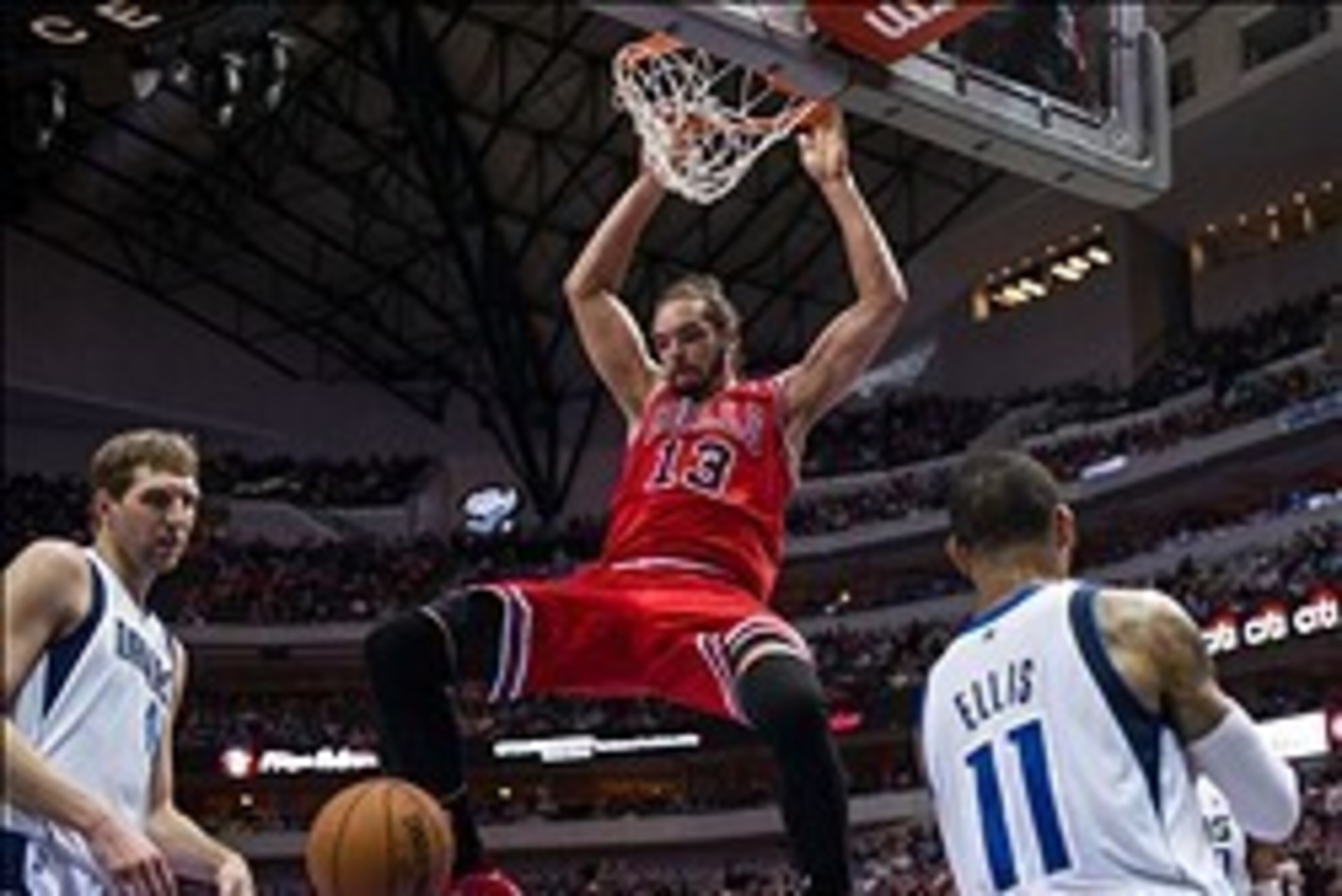 Feb 28, 2014; Dallas, TX, USA; Chicago Bulls center Joakim Noah (13) dunks the ball as Dallas Mavericks power forward Dirk Nowitzki (41) and shooting guard Monta Ellis (11) look on during the second half at the American Airlines Center. The Bulls defeated Feb 28, 2014; Dallas, TX, USA; Chicago Bulls center Joakim Noah (13) dunks the ball as Dallas Mavericks power forward Dirk Nowitzki (41) and shooting guard Monta Ellis (11) look on during the second half at the American Airlines Center. The Bulls defeated