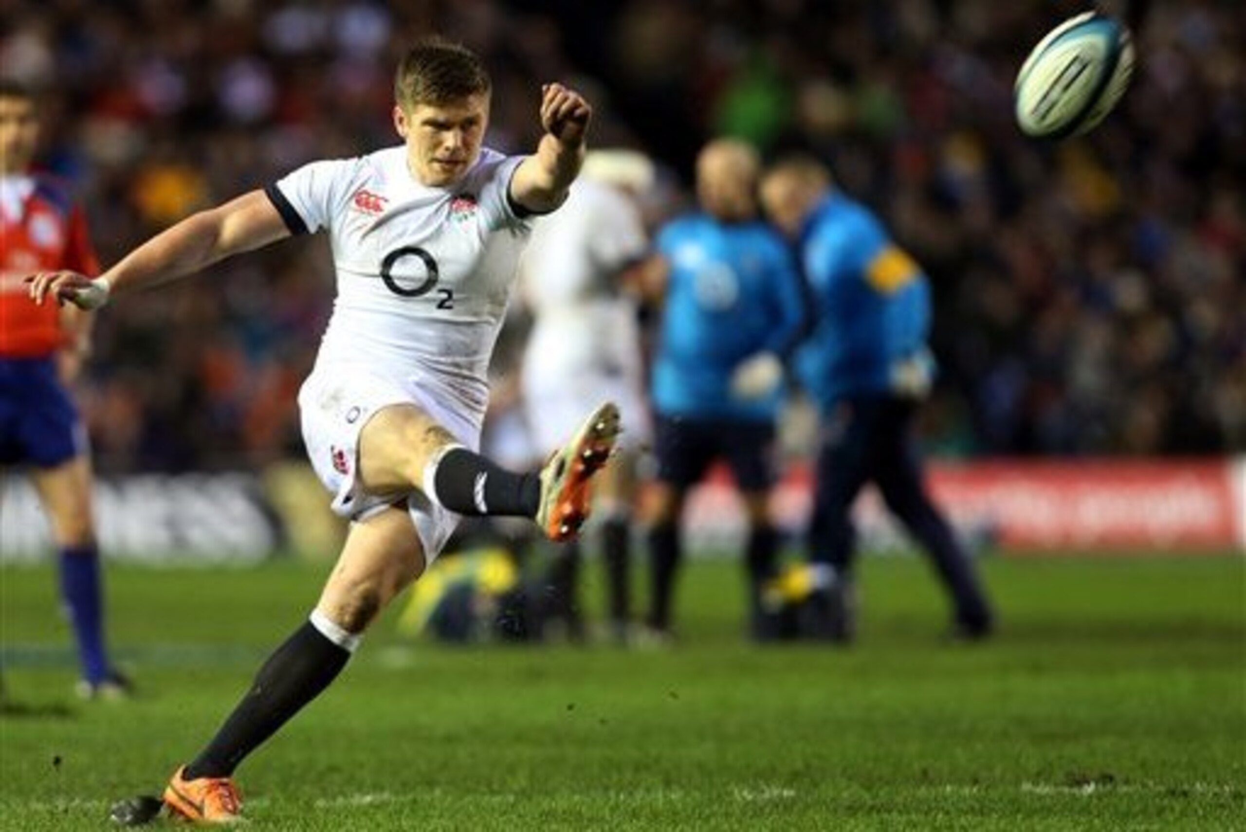 Kicking for glory: England's Owen Farrell.