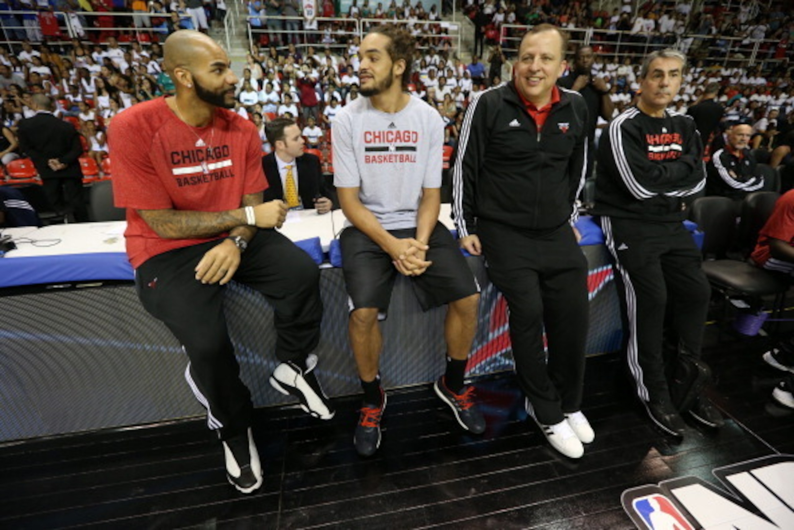 RIO DE JANIERO, BRAZIL - OCTOBER 10: Joakim Noah #13, Carlos Boozer and Tom Thibodeau of the Chicago Bulls look on during Fan Appreciation Day as part of 2013 Global Games on October 10, 2013 at HSBC Arena in Rio de Janiero, Brazil. NOTE TO USER: User exp