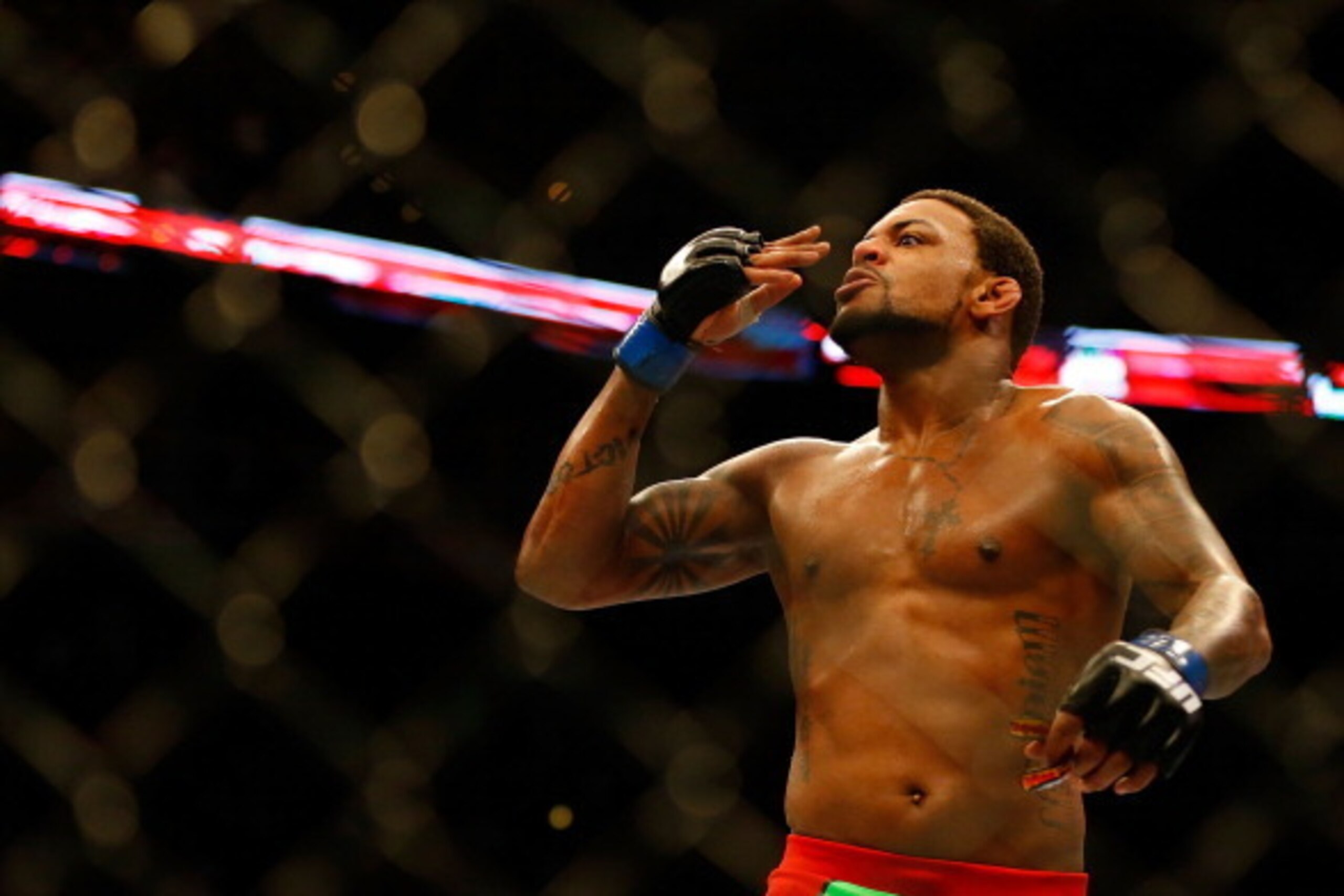 BOSTON, MA - AUGUST 17: Michael Johnson celebrates following his win against Joe Lauzon in their middleweight bout at TD Garden on August 17, 2013 in Boston, Massachusetts. (Photo by Jared Wickerham/Getty Images)