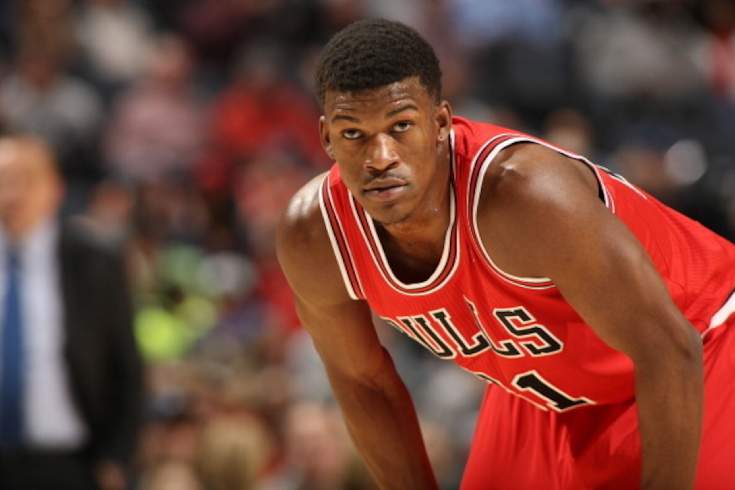 CHARLOTTE, NC - JANUARY 25:  Jimmy Butler #21 of the Chicago Bulls looks on during the game against the Charlotte Bobcats at the Time Warner Cable Arena on January 25, 2014 in Charlotte, North Carolina. NOTE TO USER: User expressly acknowledges and agrees