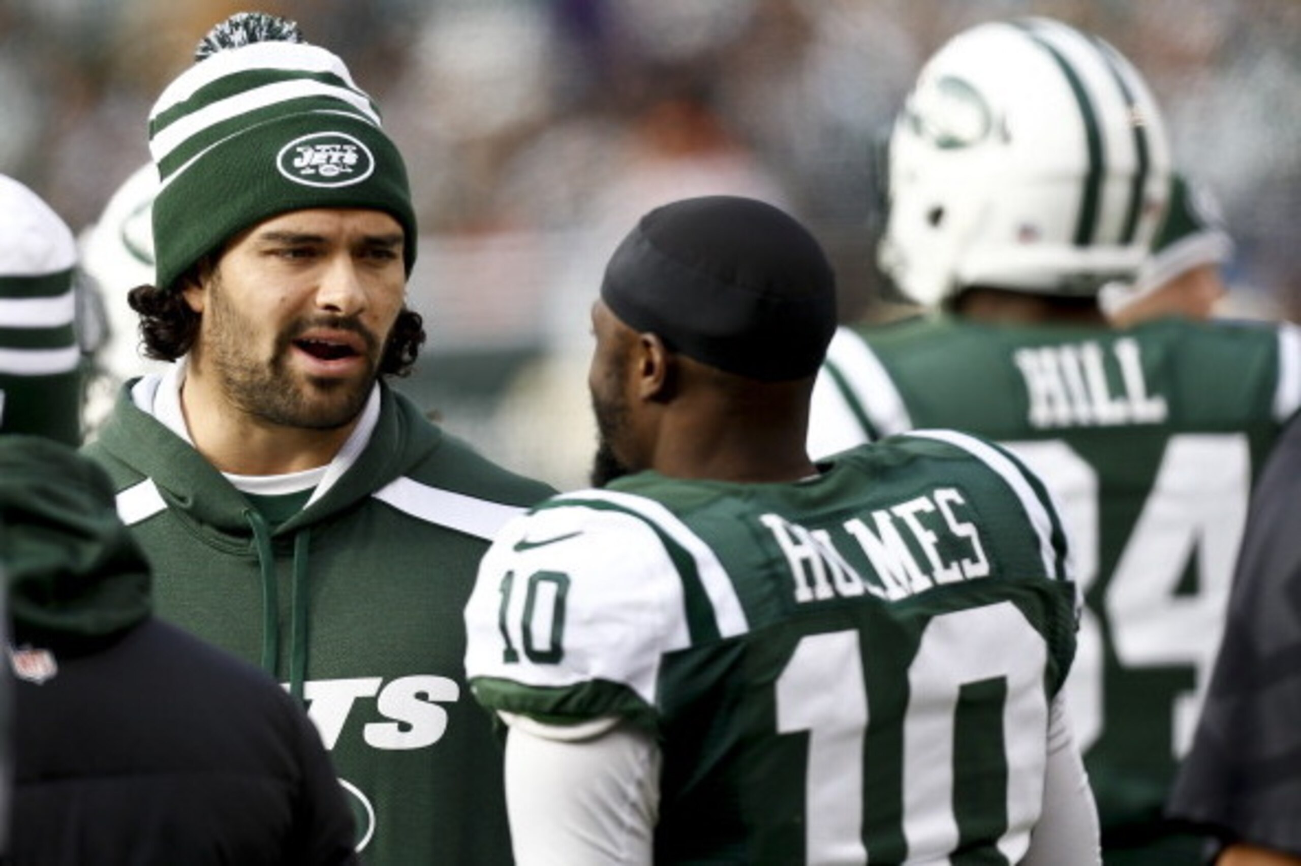 EAST RUTHERFORD, NJ - DECEMBER 1:   Mark Sanchez #6 of the New York Jets talks to Santonio Holmes #10 of the New York Jets during their game against the Miami Dolphins at MetLife Stadium on December 1, 2013 in East Rutherford, New Jersey.  (Photo by Jeff 