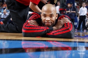 DALLAS, TX - FEBRUARY 28: Taj Gibson #22 of the Chicago Bulls stretches before a game against the Dallas Mavericks on February 28, 2014 at the American Airlines Center in Dallas, Texas. NOTE TO USER: User expressly acknowledges and agrees that, by downloa DALLAS, TX - FEBRUARY 28: Taj Gibson #22 of the Chicago Bulls stretches before a game against the Dallas Mavericks on February 28, 2014 at the American Airlines Center in Dallas, Texas. NOTE TO USER: User expressly acknowledges and agrees that, by downloa