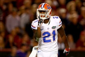 COLUMBIA, SC - NOVEMBER 16:  Kelvin Taylor #21 of the Florida Gators celebrates after scoring a touchdown during their game against the South Carolina Gamecocks at Williams-Brice Stadium on November 16, 2013 in Columbia, South Carolina.  (Photo by Streete