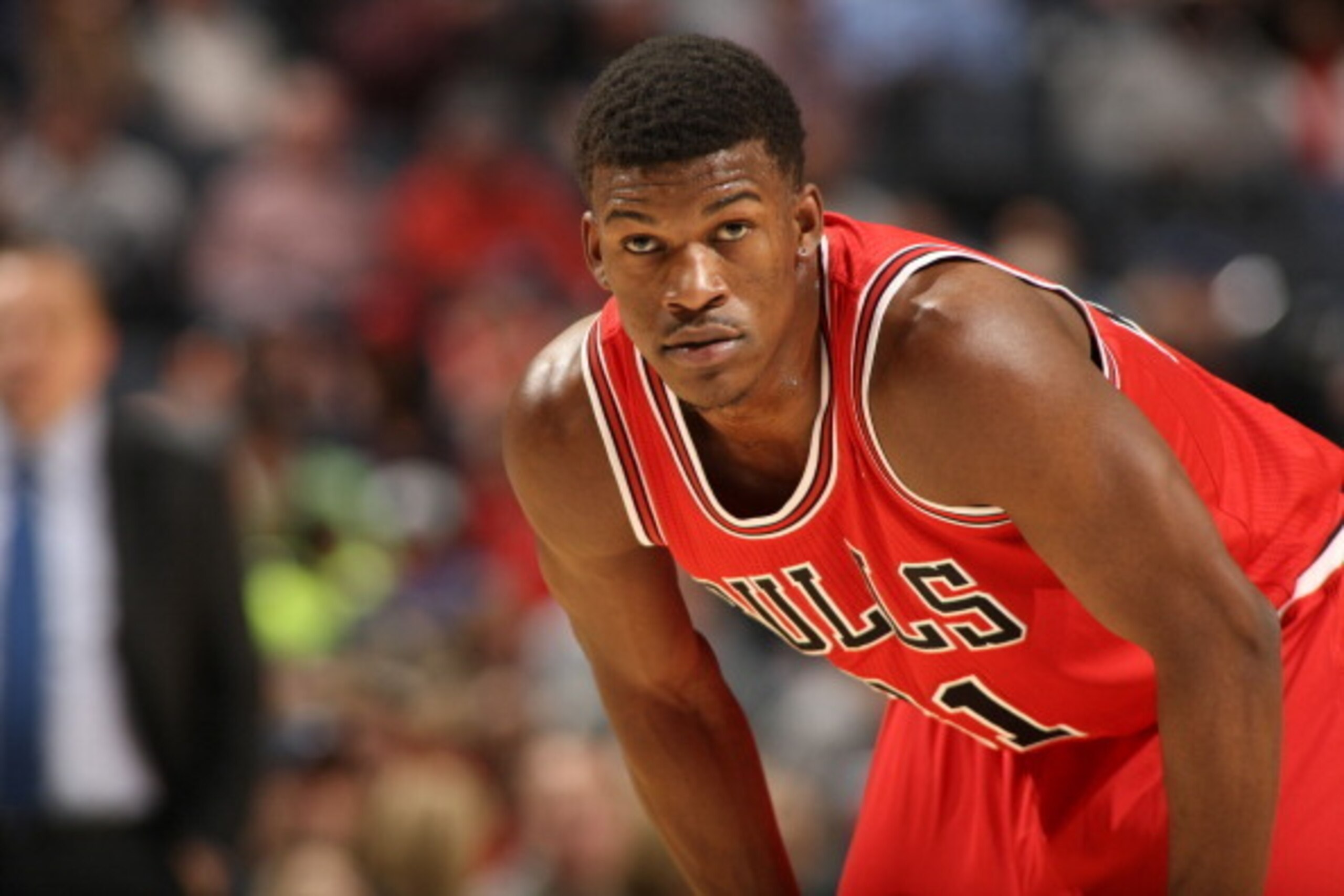 CHARLOTTE, NC - JANUARY 25: Jimmy Butler #21 of the Chicago Bulls looks on during the game against the Charlotte Bobcats at the Time Warner Cable Arena on January 25, 2014 in Charlotte, North Carolina. NOTE TO USER: User expressly acknowledges and agrees CHARLOTTE, NC - JANUARY 25: Jimmy Butler #21 of the Chicago Bulls looks on during the game against the Charlotte Bobcats at the Time Warner Cable Arena on January 25, 2014 in Charlotte, North Carolina. NOTE TO USER: User expressly acknowledges and agrees