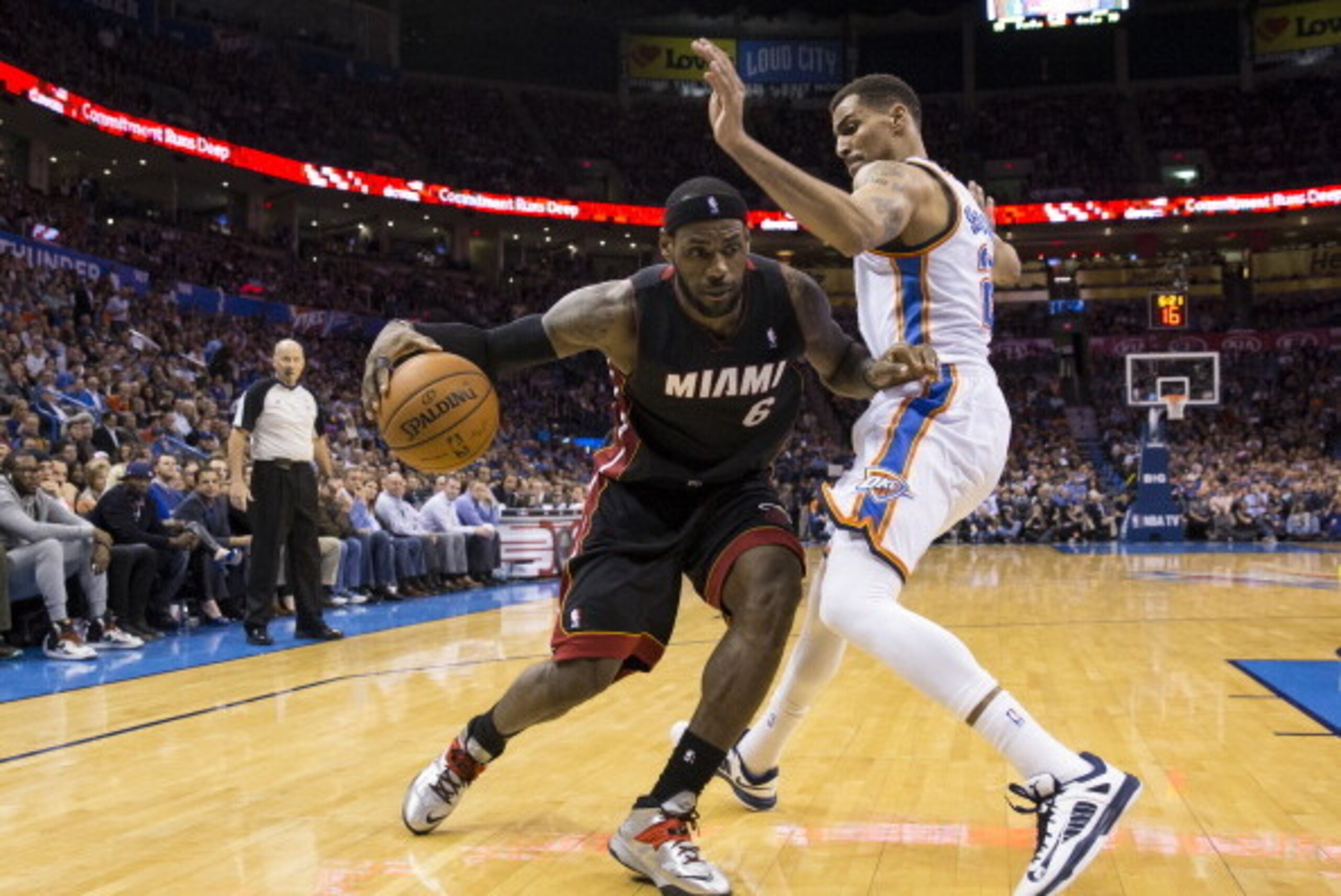 Oklahoma City, OK - February 20: LeBron James #6 of the Miami Heat drives to the basket against the Oklahoma City Thunder at the Chesapeake Arena on February 20, 2014 in Oklahoma City, OK. NOTE TO USER:  User expressly acknowledges and agrees that, by dow