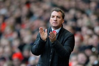 LIVERPOOL, ENGLAND - FEBRUARY 08:  Liverpool Manager Brendan Rodgers applauds during the Barclays Premier League match between Liverpool and Arsenal at Anfield on February 8, 2014 in Liverpool, England.  (Photo by Michael Regan/Getty Images)