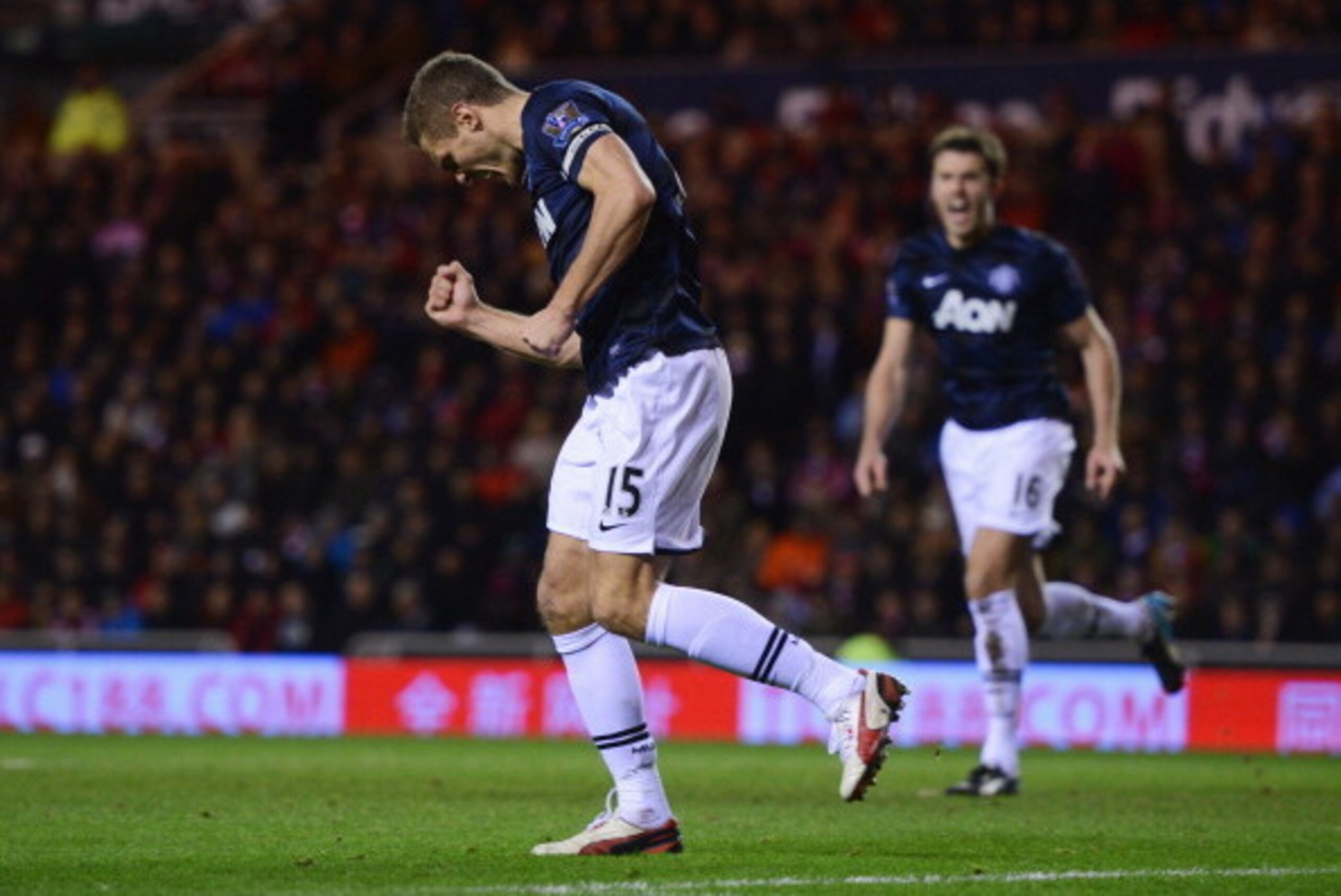 SUNDERLAND, ENGLAND - JANUARY 07:  Nemanja Vidic of Manchester United (15) celebrates as he scores their first goal with a header during the Capital One Cup Semi-Final, first leg match between Sunderland and Manchester United at Stadium of Light on Januar