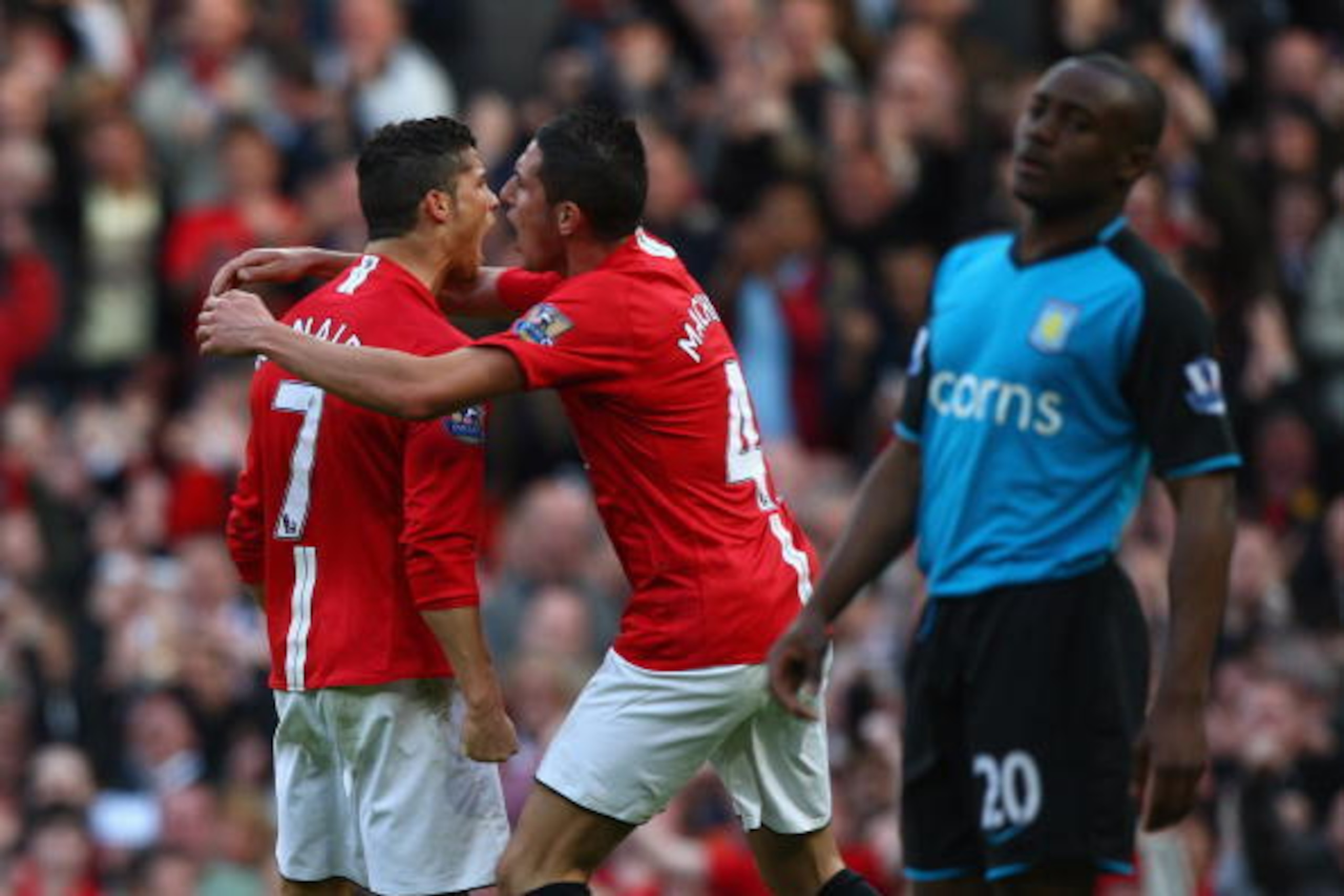 MANCHESTER, ENGLAND - APRIL 05:  Frederico Macheda of Manchester United congratulates team mate Cristiano Ronaldo after he scored his team's second goal during the Barclays Premier League match between Manchester United and Aston Villa at Old Trafford on 