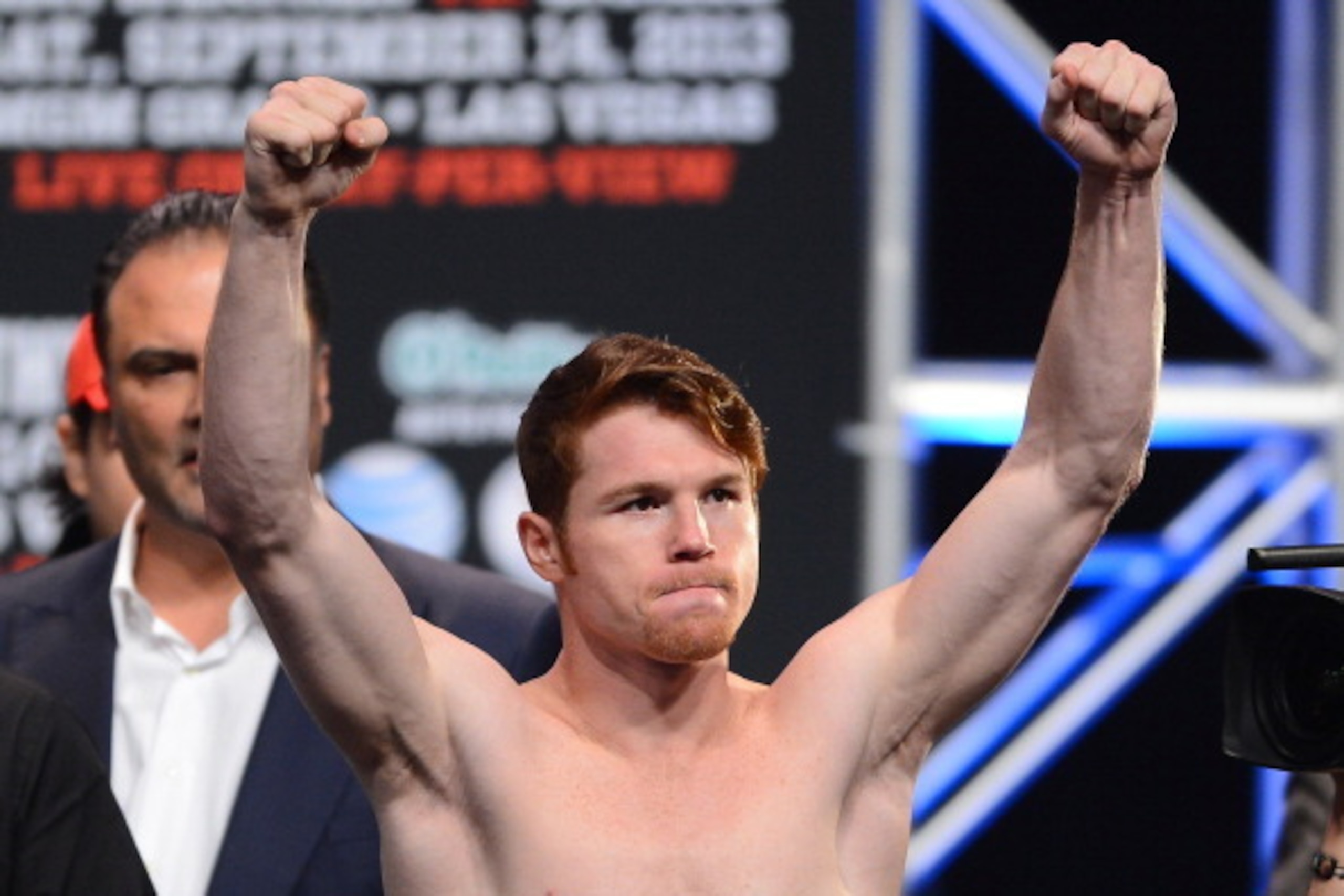 LAS VEGAS, NV - SEPTEMBER 13:  Boxer Canelo Alvarez poses during the official weigh-in for his bout against Floyd Mayweather Jr. at the MGM Grand Garden Arena on September 13, 2013 in Las Vegas, Nevada. The fighters will meet in a WBC/WBA 154-pound title 