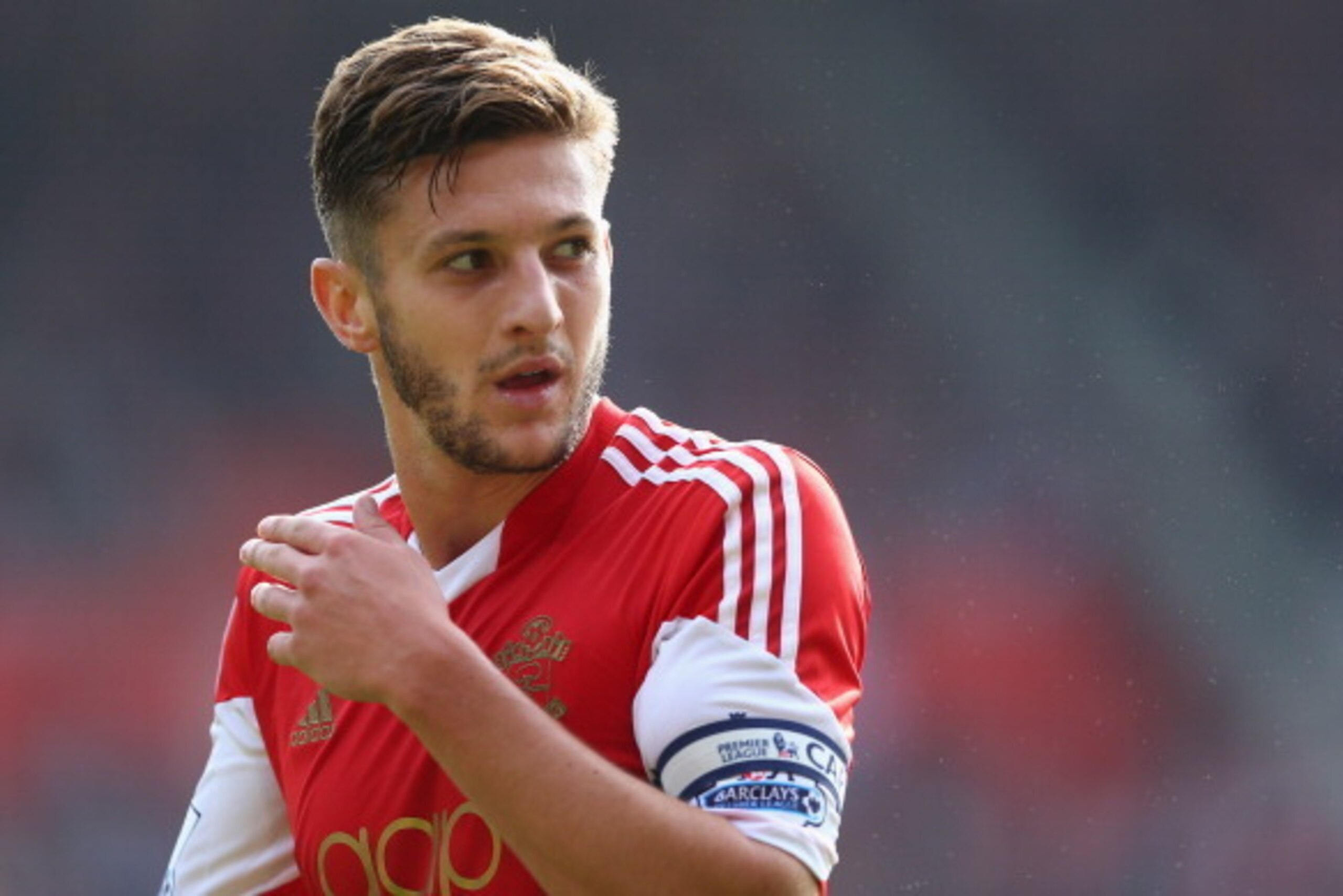 SOUTHAMPTON, ENGLAND - SEPTEMBER 28:  Adam Lallana of Southampton in action during the Barclays Premier League match between Southampton and Crystal Palace at St Mary's Stadium on September 28, 2013 in Southampton, England.  (Photo by Paul Gilham/Getty Im