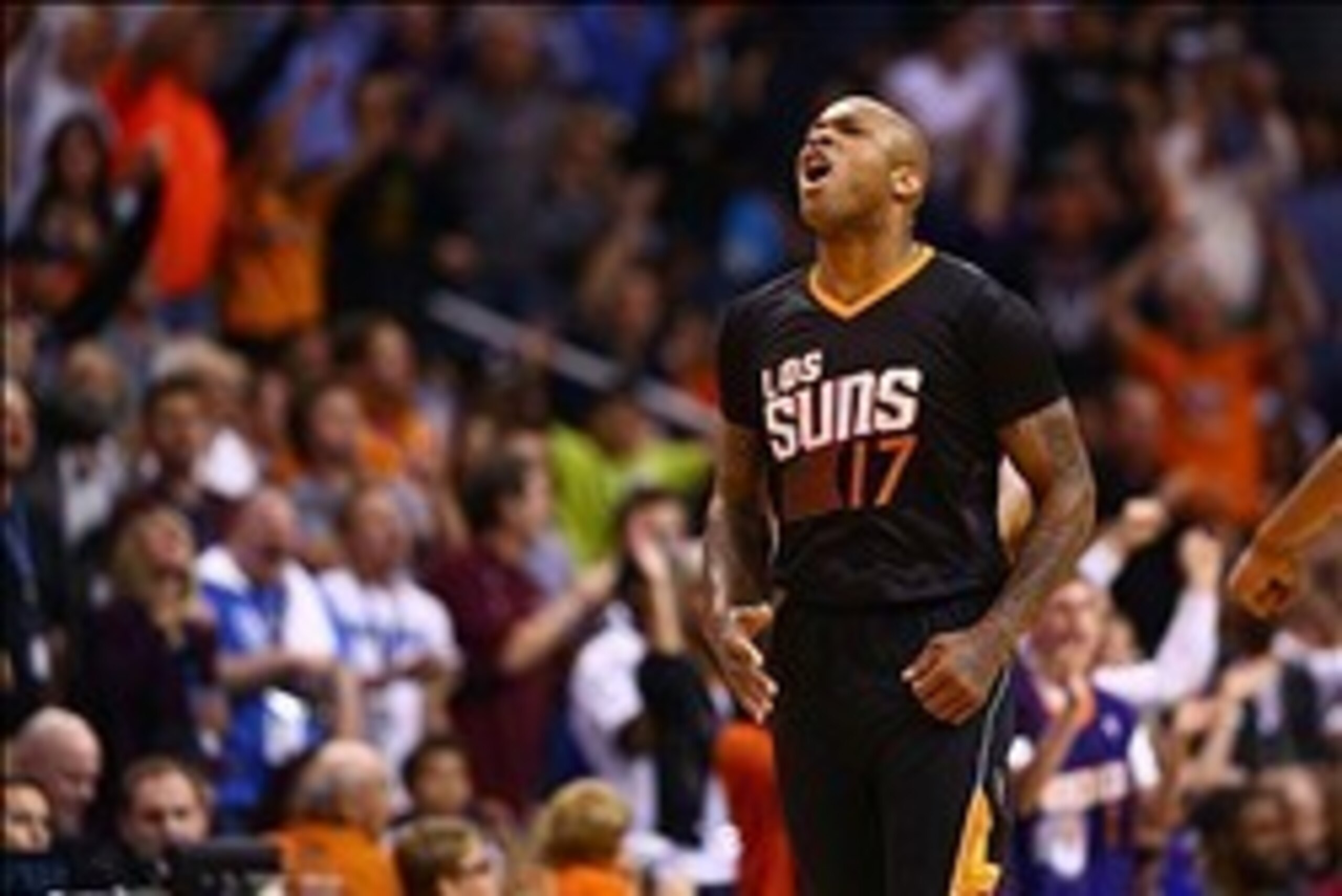 Mar 6, 2014; Phoenix, AZ, USA; Phoenix Suns forward P.J. Tucker celebrates in the fourth quarter against the Oklahoma City Thunder at the US Airways Center. The Suns defeated the Thunder 128-122. Mandatory Credit: Mark J. Rebilas-USA TODAY Sports