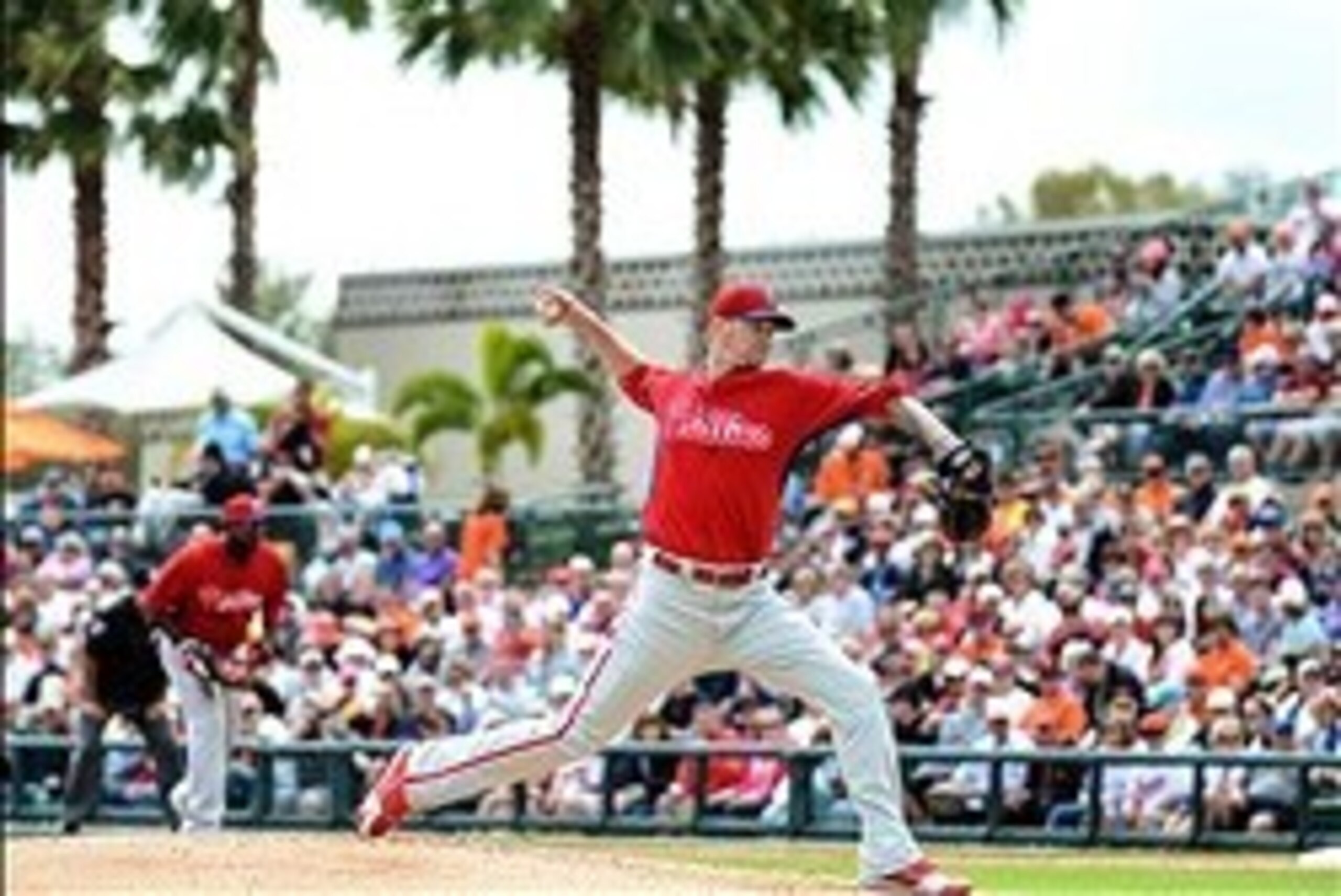Mar 7, 2014; Sarasota, FL, USA; Philadelphia Phillies starting pitcher A.J. Burnett (34) throws a pitch during the spring  training exhibition game against Baltimore Orioles  at Ed Smith Stadium. Mandatory Credit: Jonathan Dyer-USA TODAY Sports