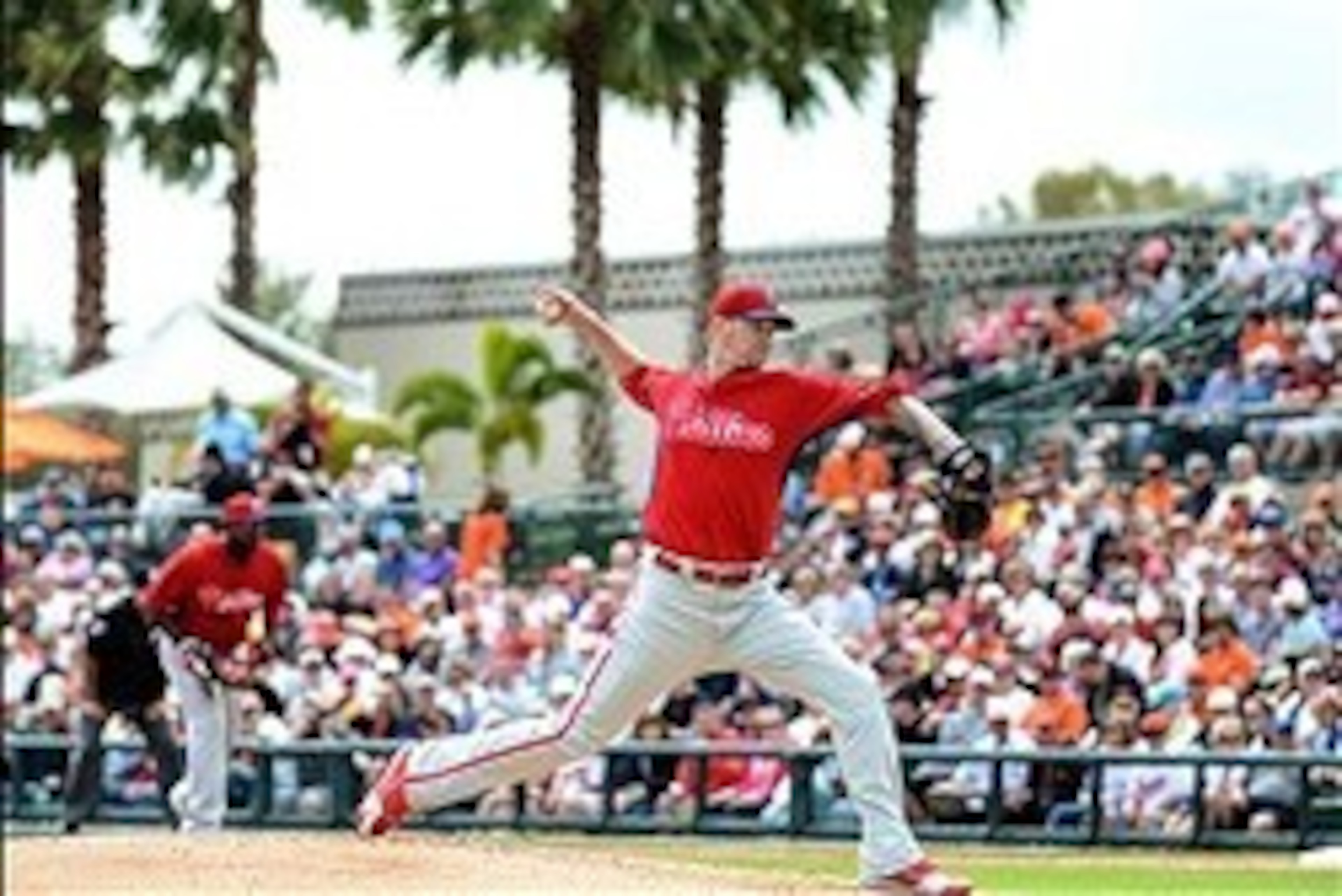 Mar 7, 2014; Sarasota, FL, USA; Philadelphia Phillies starting pitcher A.J. Burnett (34) throws a pitch during the spring  training exhibition game against Baltimore Orioles  at Ed Smith Stadium. Mandatory Credit: Jonathan Dyer-USA TODAY Sports
