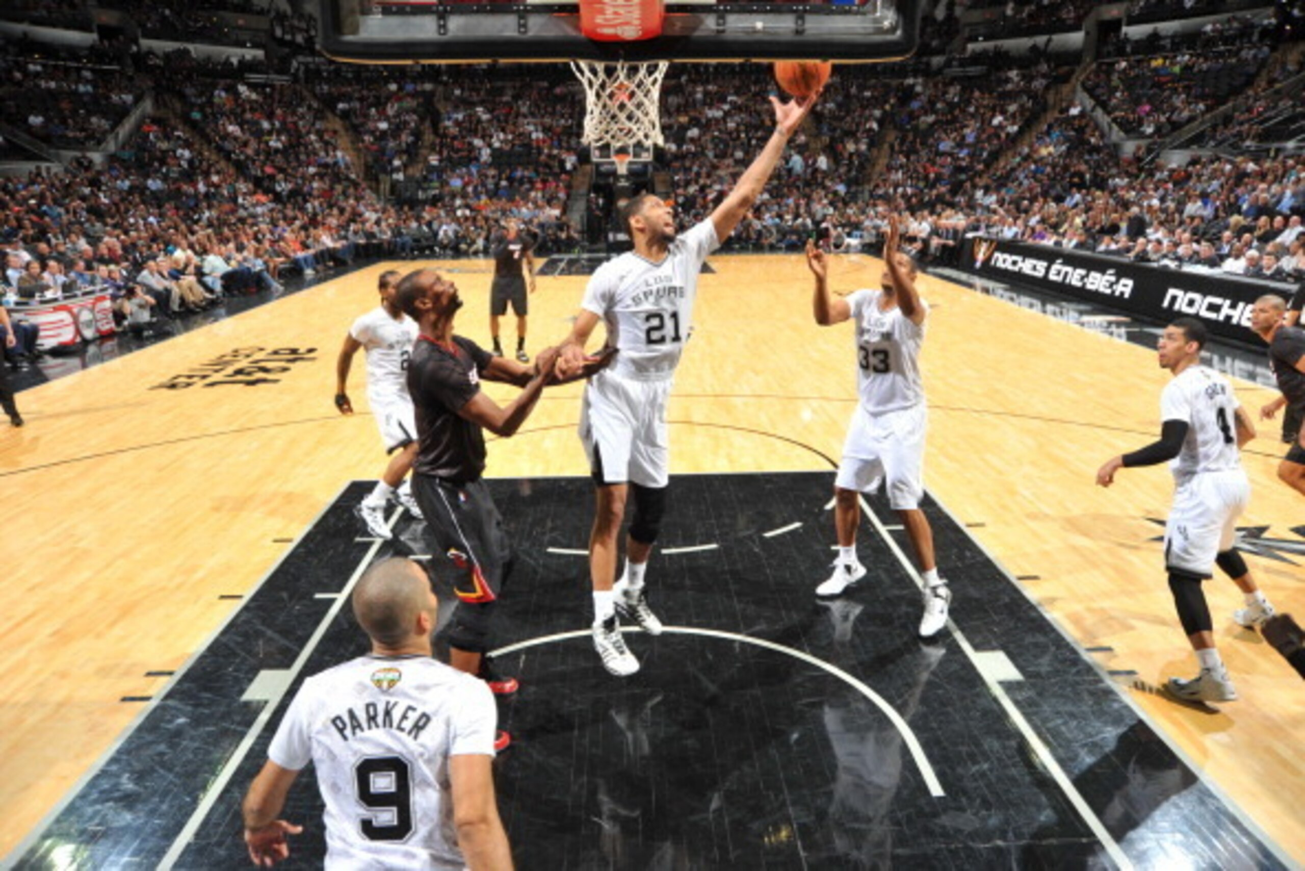 SAN ANTONIO, TX - MARCH 6: Tim Duncan #21 of the San Antonio Spurs takes a shot during a game against the Miami Heat at the AT&T Center March 6, 2014 in San Antonio, Texas. NOTE TO USER: User expressly acknowledges and agrees that, by downloading and or u