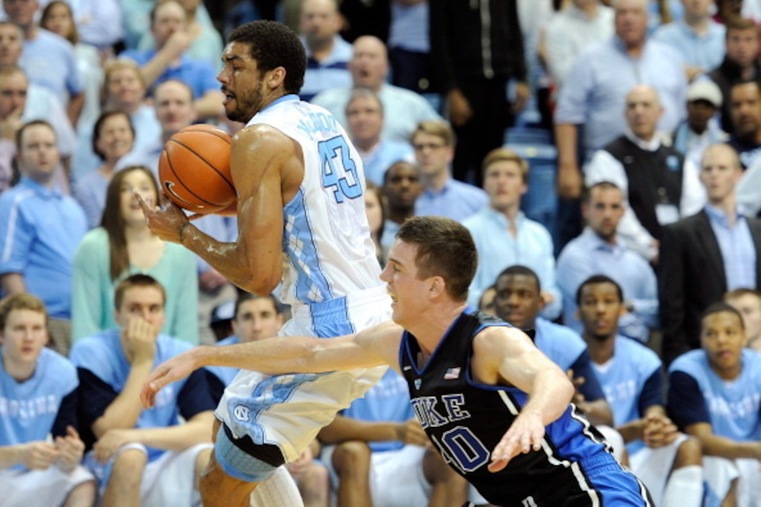CHAPEL HILL, NC - FEBRUARY 20: James Michael McAdoo #43 of the North Carolina Tar Heels battles Marshall Plumlee #40 of the Duke Blue Devils for the ball during their game at the Dean Smith Center on February 20, 2014 in Chapel Hill, North Carolina. Nort CHAPEL HILL, NC - FEBRUARY 20: James Michael McAdoo #43 of the North Carolina Tar Heels battles Marshall Plumlee #40 of the Duke Blue Devils for the ball during their game at the Dean Smith Center on February 20, 2014 in Chapel Hill, North Carolina. Nort