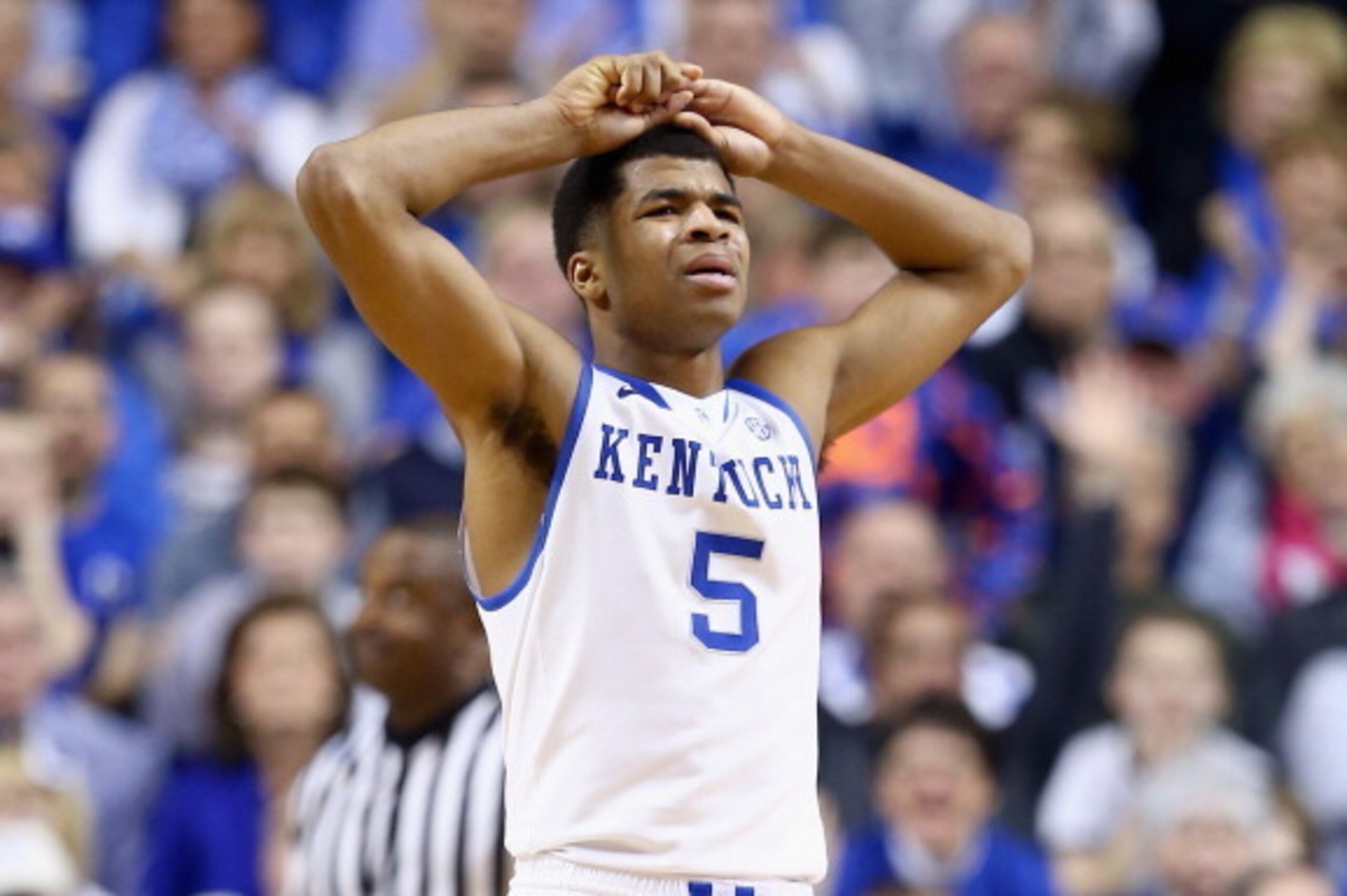 LEXINGTON, KY - FEBRUARY 27: Andrew Harrison #5 of the Kentucky Wildcats reacts to a foul during the game against the Arkansas Razorbacks at Rupp Arena on February 27, 2014 in Lexington, Kentucky. (Photo by Andy Lyons/Getty Images) LEXINGTON, KY - FEBRUARY 27: Andrew Harrison #5 of the Kentucky Wildcats reacts to a foul during the game against the Arkansas Razorbacks at Rupp Arena on February 27, 2014 in Lexington, Kentucky. (Photo by Andy Lyons/Getty Images)
