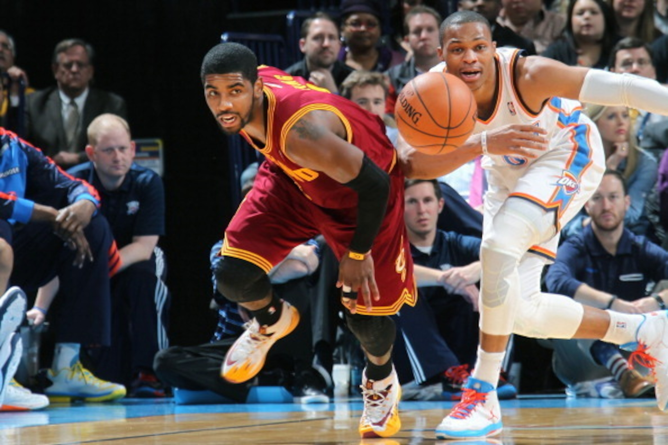 OKLAHOMA CITY, OK - FEBRUARY 26: Kyrie Irving #2 of the Cleveland Cavaliers goes after the ball against the Oklahoma City Thunder during an NBA game on February 26, 2014 at the Chesapeake Energy Arena in Oklahoma City, Oklahoma. NOTE TO USER: User express OKLAHOMA CITY, OK - FEBRUARY 26: Kyrie Irving #2 of the Cleveland Cavaliers goes after the ball against the Oklahoma City Thunder during an NBA game on February 26, 2014 at the Chesapeake Energy Arena in Oklahoma City, Oklahoma. NOTE TO USER: User express