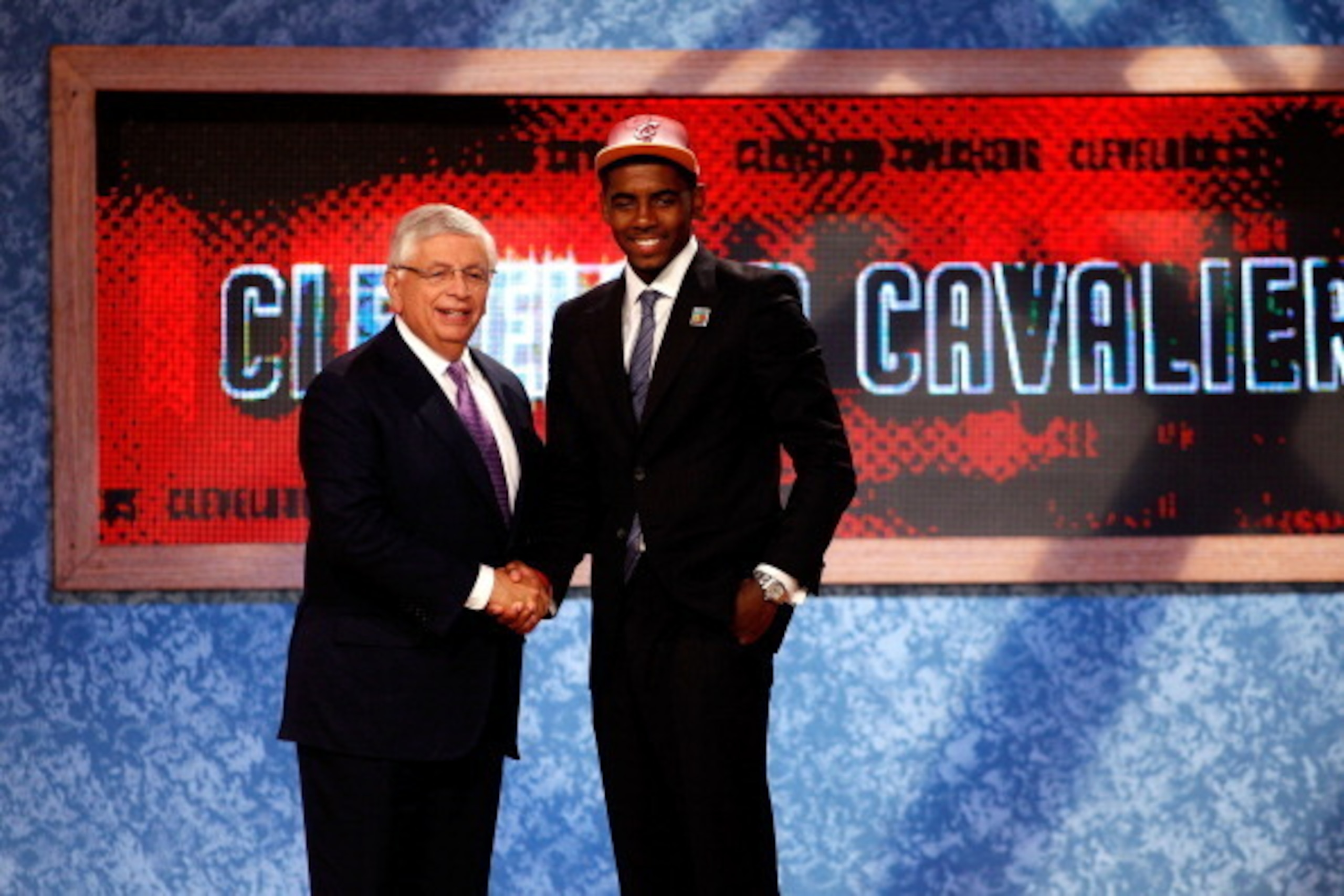 NEWARK, NJ - JUNE 23: Kyrie Irving (R) from Duke greets NBA Commissioner David Stern after he was selected number one overall by the Cleveland Cavaliers in the first round during the 2011 NBA Draft at the Prudential Center on June 23, 2011 in Newark, New NEWARK, NJ - JUNE 23: Kyrie Irving (R) from Duke greets NBA Commissioner David Stern after he was selected number one overall by the Cleveland Cavaliers in the first round during the 2011 NBA Draft at the Prudential Center on June 23, 2011 in Newark, New