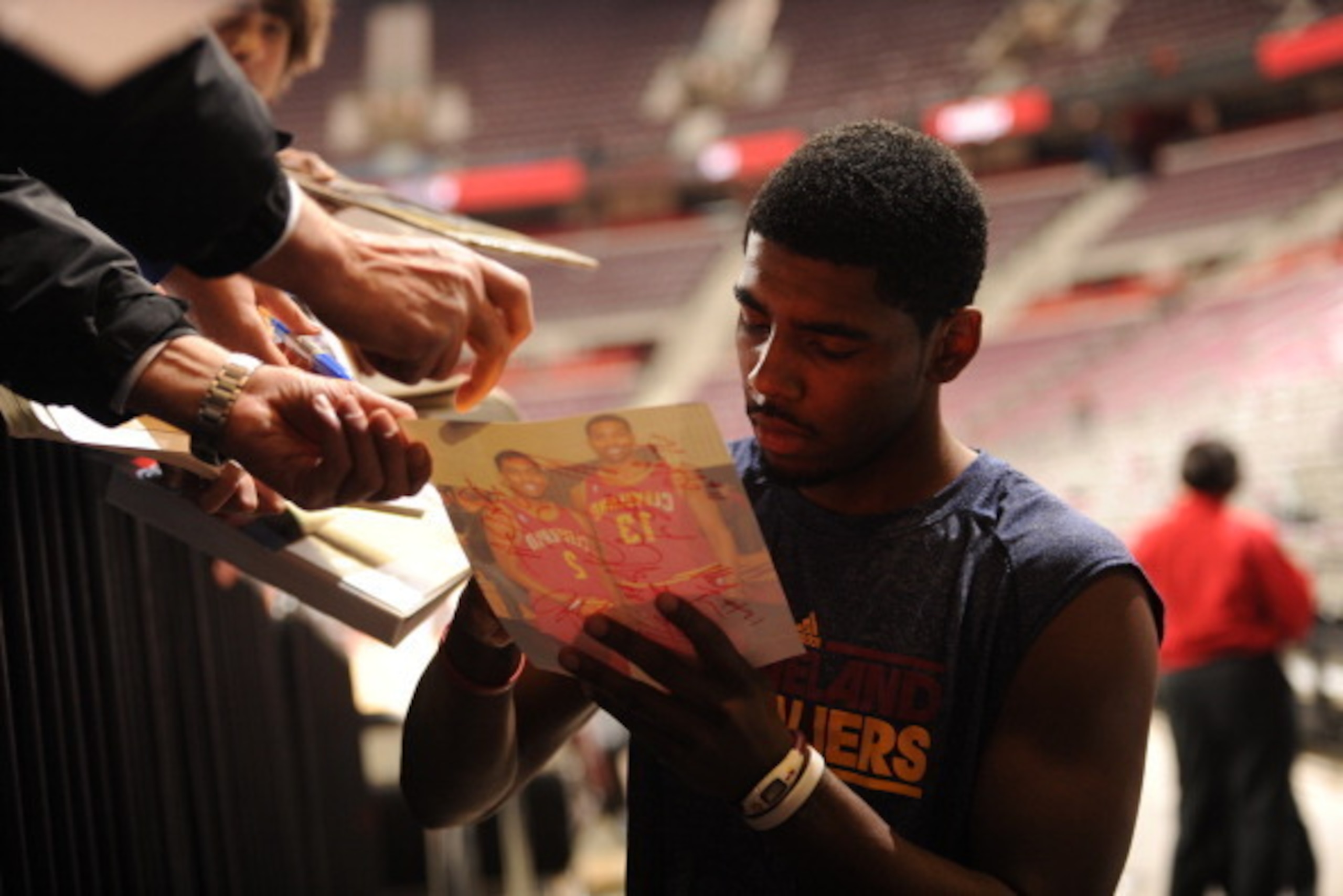 DETROIT, MI - DECEMBER 16: Kyrie Irving #2 of the Cleveland Cavaliers signs autographs before the basketball game against the Detroit Pistons during the preseason game on December 16, 2011 at The Palace of Auburn Hills in Auburn Hills, Michigan. NOTE TO DETROIT, MI - DECEMBER 16: Kyrie Irving #2 of the Cleveland Cavaliers signs autographs before the basketball game against the Detroit Pistons during the preseason game on December 16, 2011 at The Palace of Auburn Hills in Auburn Hills, Michigan. NOTE TO