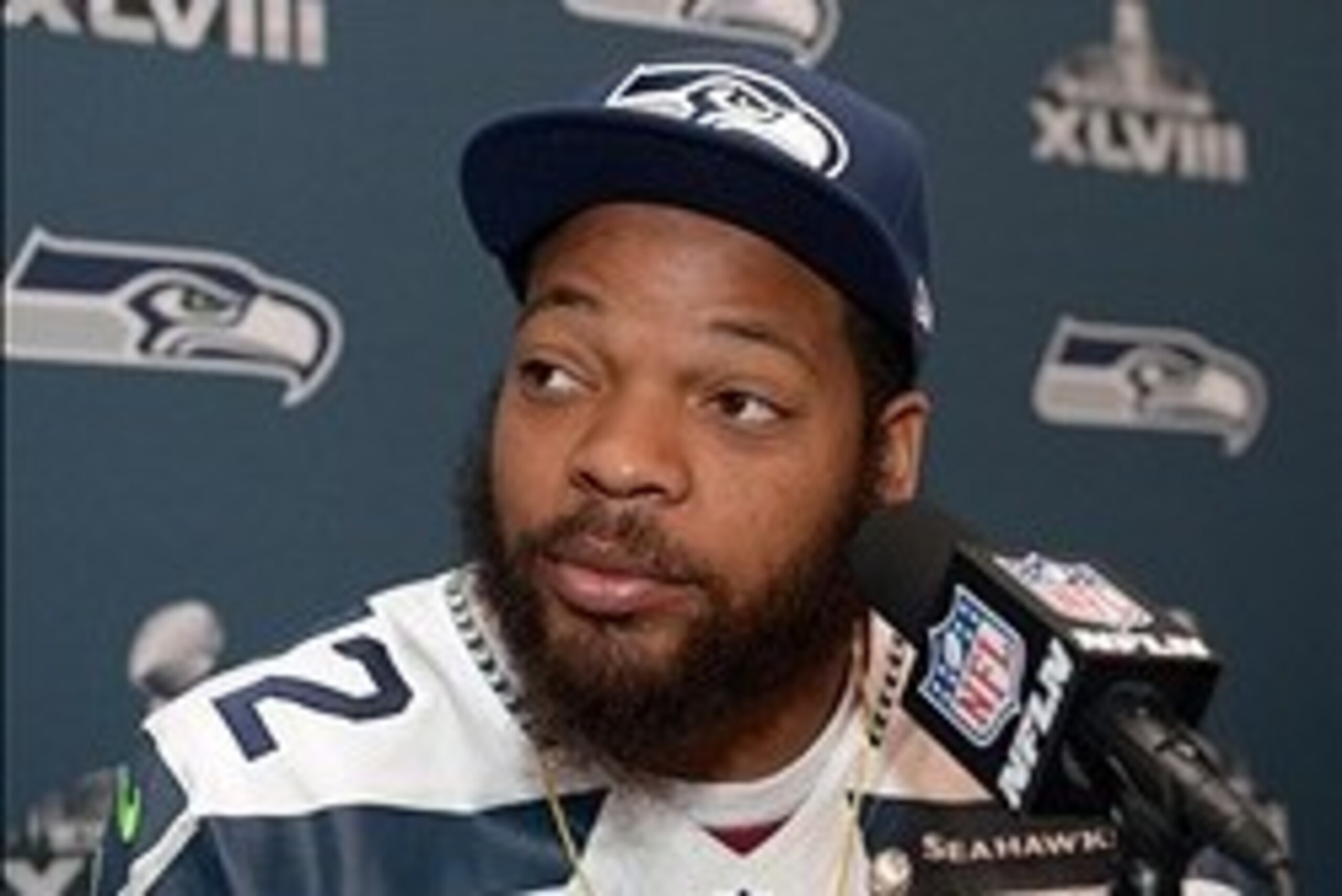 Jan 30, 2014; Jersey City, NJ, USA; Seattle Seahawks defensive end Michael Bennett (72) at a press conference at The Westin in advance of Super Bowl XLVIII. Mandatory Credit: Kirby Lee-USA TODAY Sports