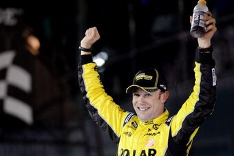 DAYTONA BEACH, FL - FEBRUARY 20:  Matt Kenseth, driver of the #20 Dollar General Toyota, celebrates in Victory Lane after winning the NASCAR Sprint Cup Series Budweiser Duel 1 at Daytona International Speedway on February 20, 2014 in Daytona Beach, Florid
