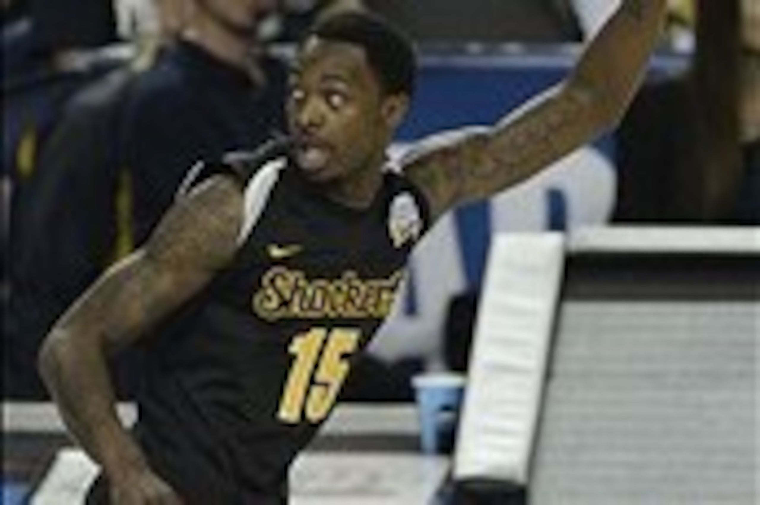 Apr 6, 2013; Atlanta, GA, USA; Wichita State Shockers guard Nick Wiggins (15) reacts after a score against the Louisville Cardinals in the first half of the semifinals during the 2013 NCAA mens Final Four at the Georgia Dome. Mandatory Credit: Richard Ma Apr 6, 2013; Atlanta, GA, USA; Wichita State Shockers guard Nick Wiggins (15) reacts after a score against the Louisville Cardinals in the first half of the semifinals during the 2013 NCAA mens Final Four at the Georgia Dome. Mandatory Credit: Richard Ma